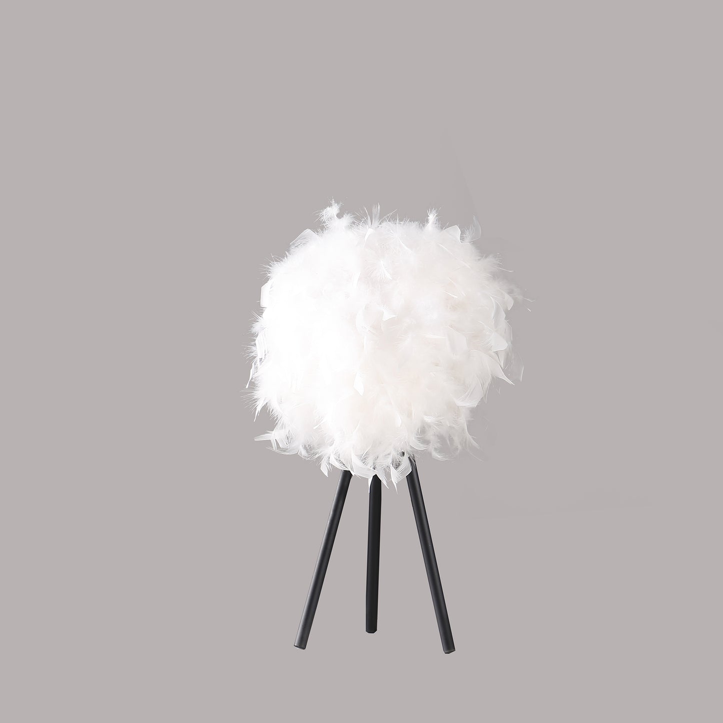 Fluffy white feather table lamp with black tripod base elegant lighting for bedrooms