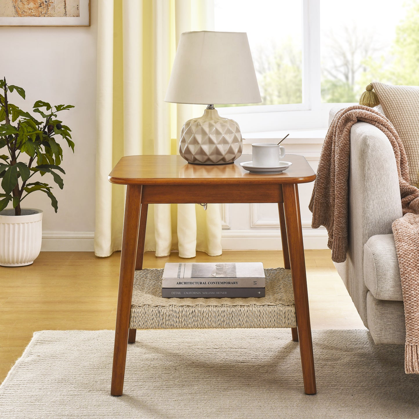Midcentury modern wooden end table with woven shelf and contemporary lamp