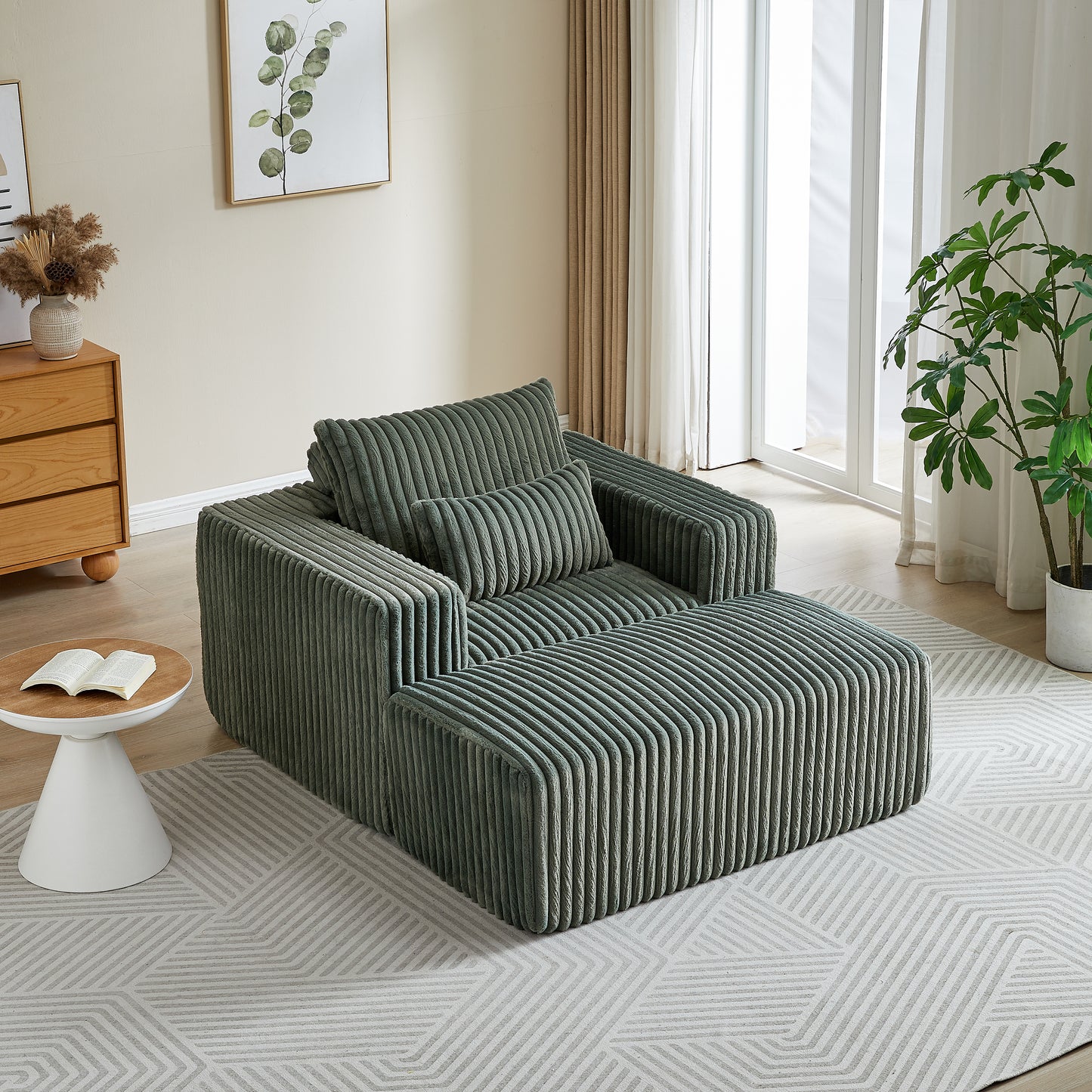 Sage green corduroy modular sofa with rounded edges and plush texture