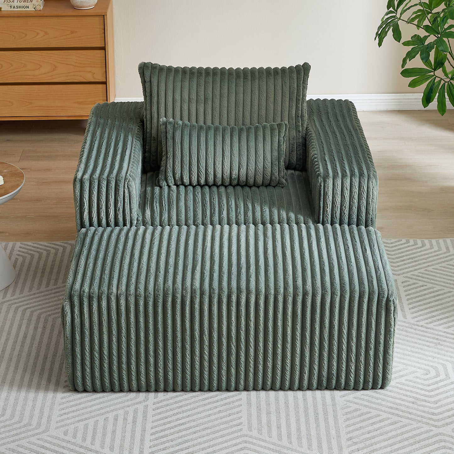 Plush corduroy sofa in sage green featuring plush texture and comfortable seating