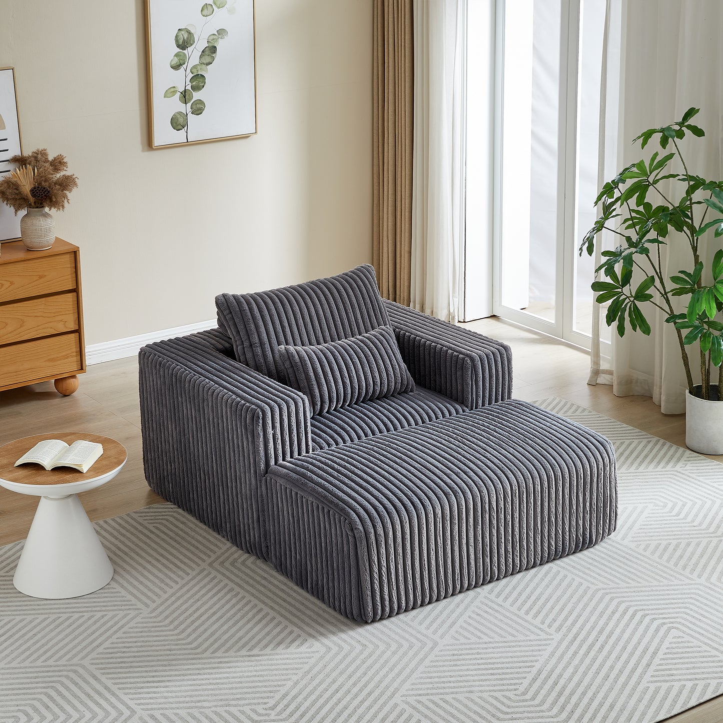 Plush grey corduroy modular sofa with ottoman and matching throw pillows perfect for living rooms