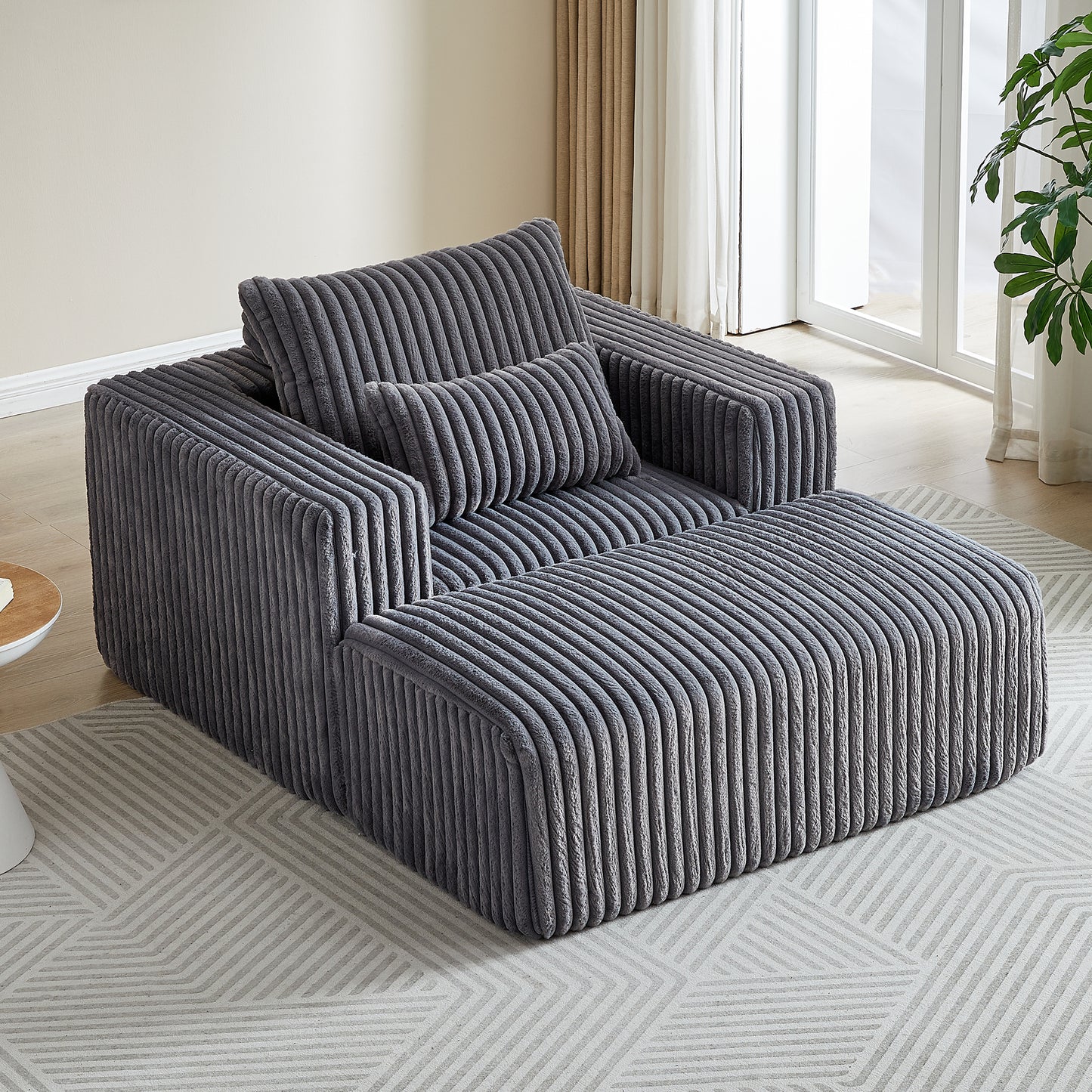 Plush grey corduroy sectional sofa with a modern modular design perfect for cozy living rooms
