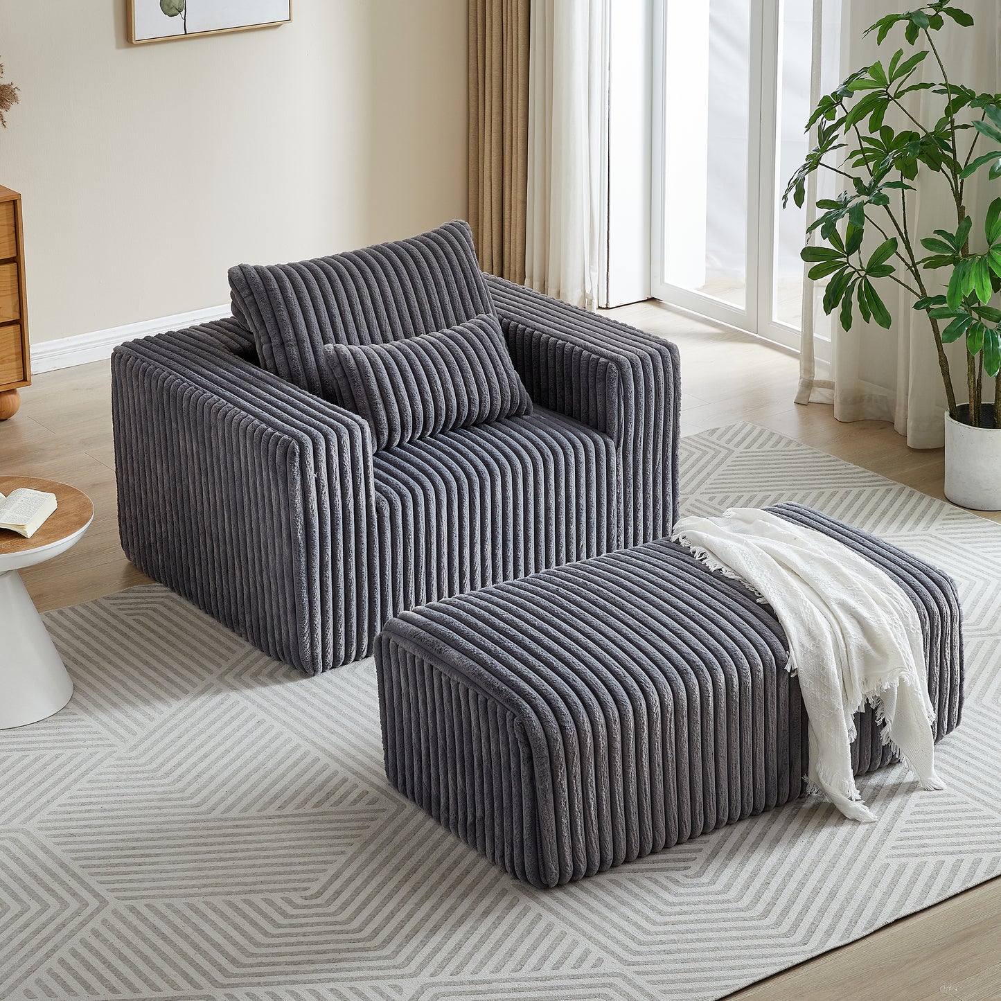 Plush grey corduroy armchair with matching ottoman modern living room seating