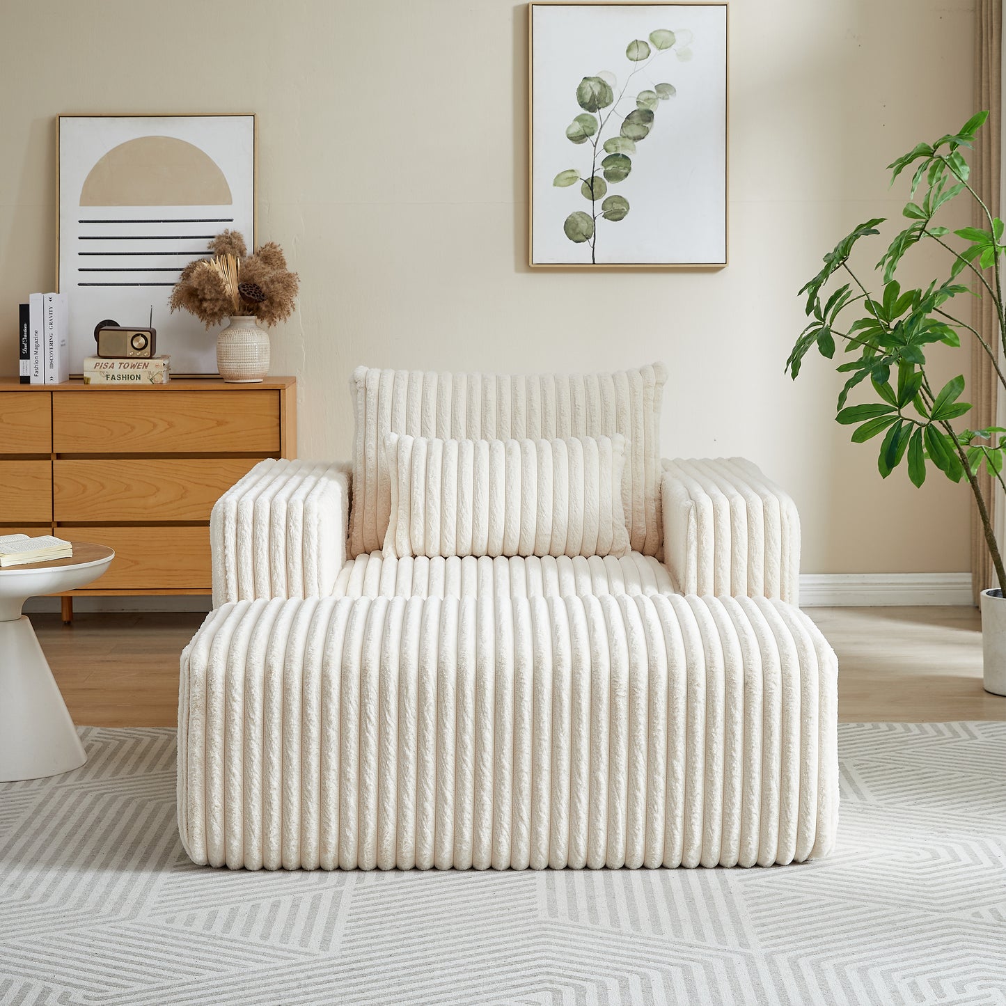 Plush cream corduroy armchair with matching ottoman and lumbar pillow