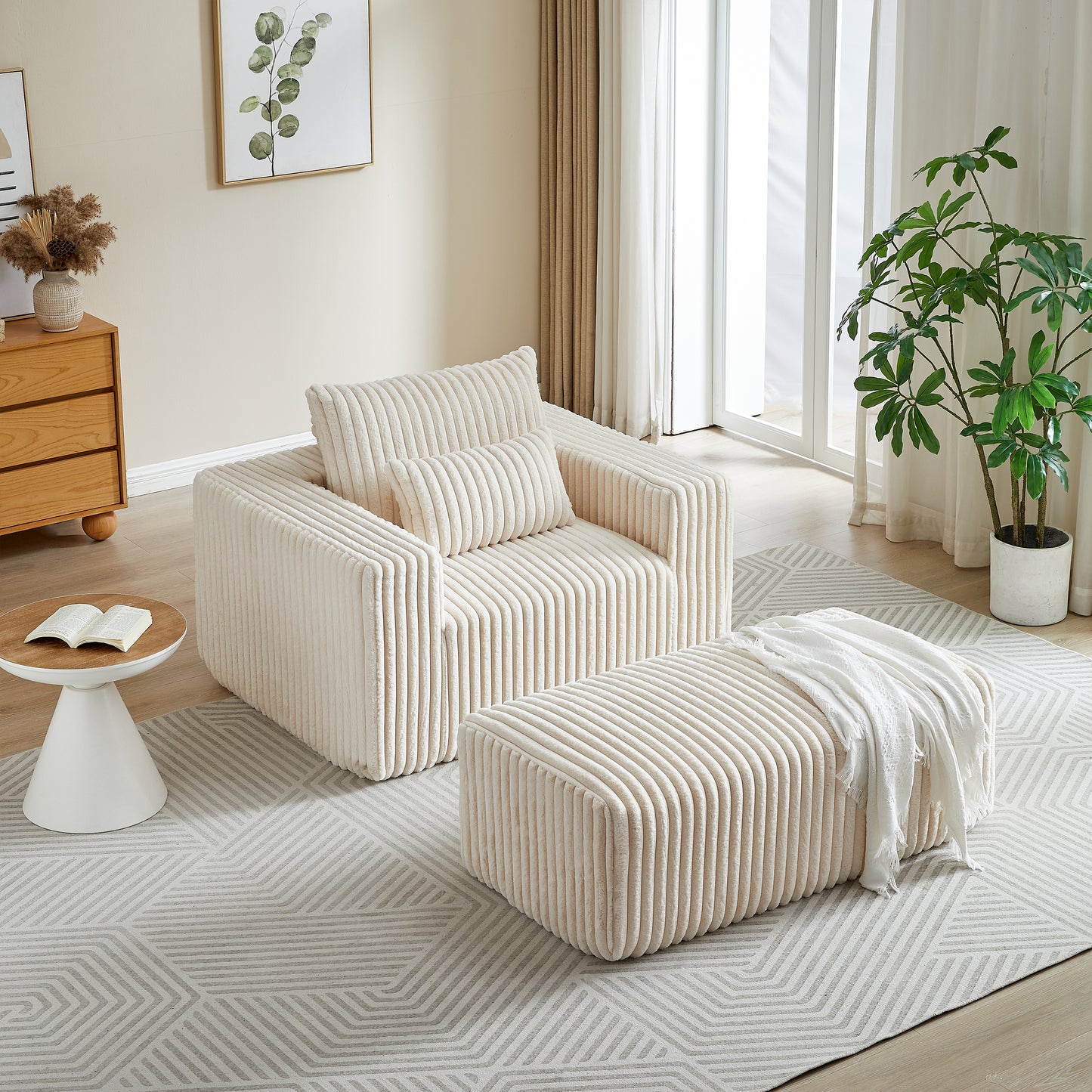 Plush cream corduroy armchair with matching ottoman perfect for a cozy living room
