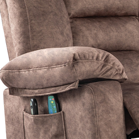 Brown fabric recliner armchair with builtin side pockets holding remotes