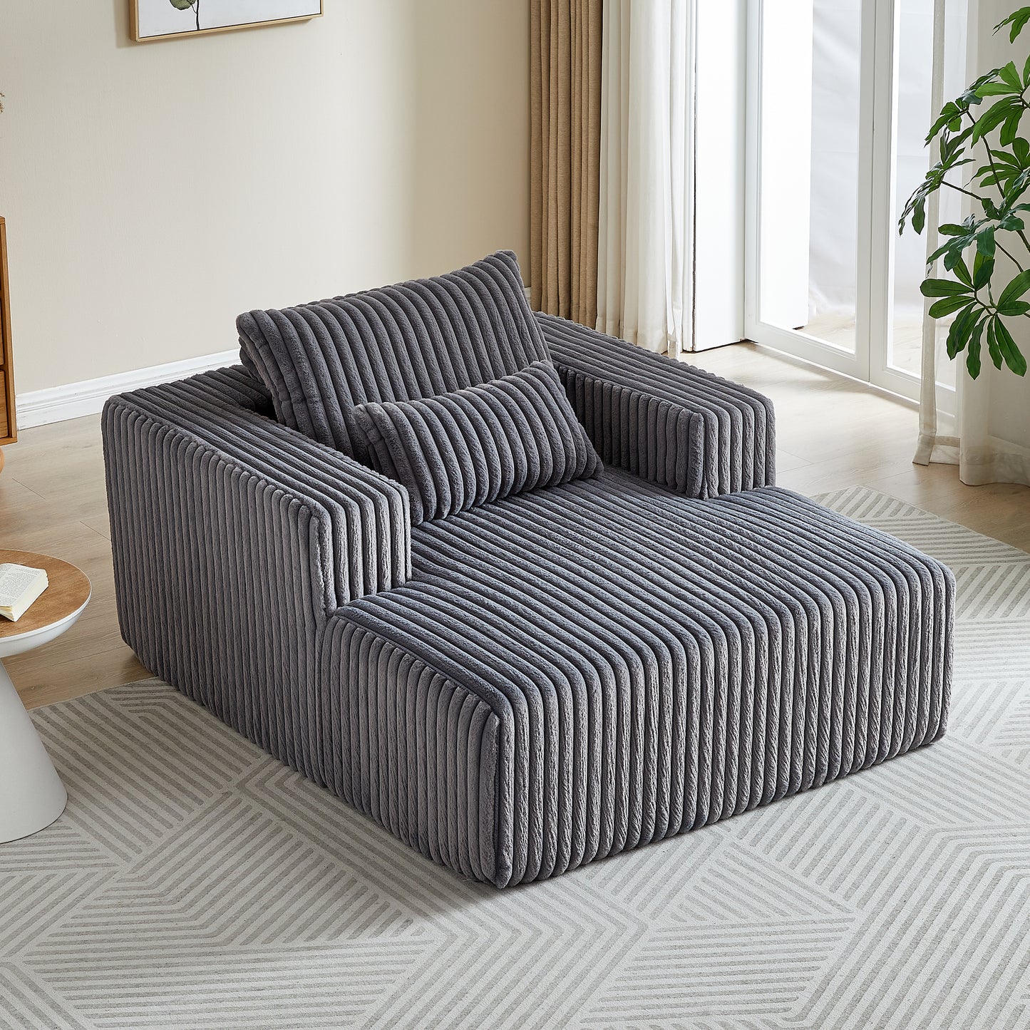 Plush grey corduroy sectional sofa with a modern lowprofile design