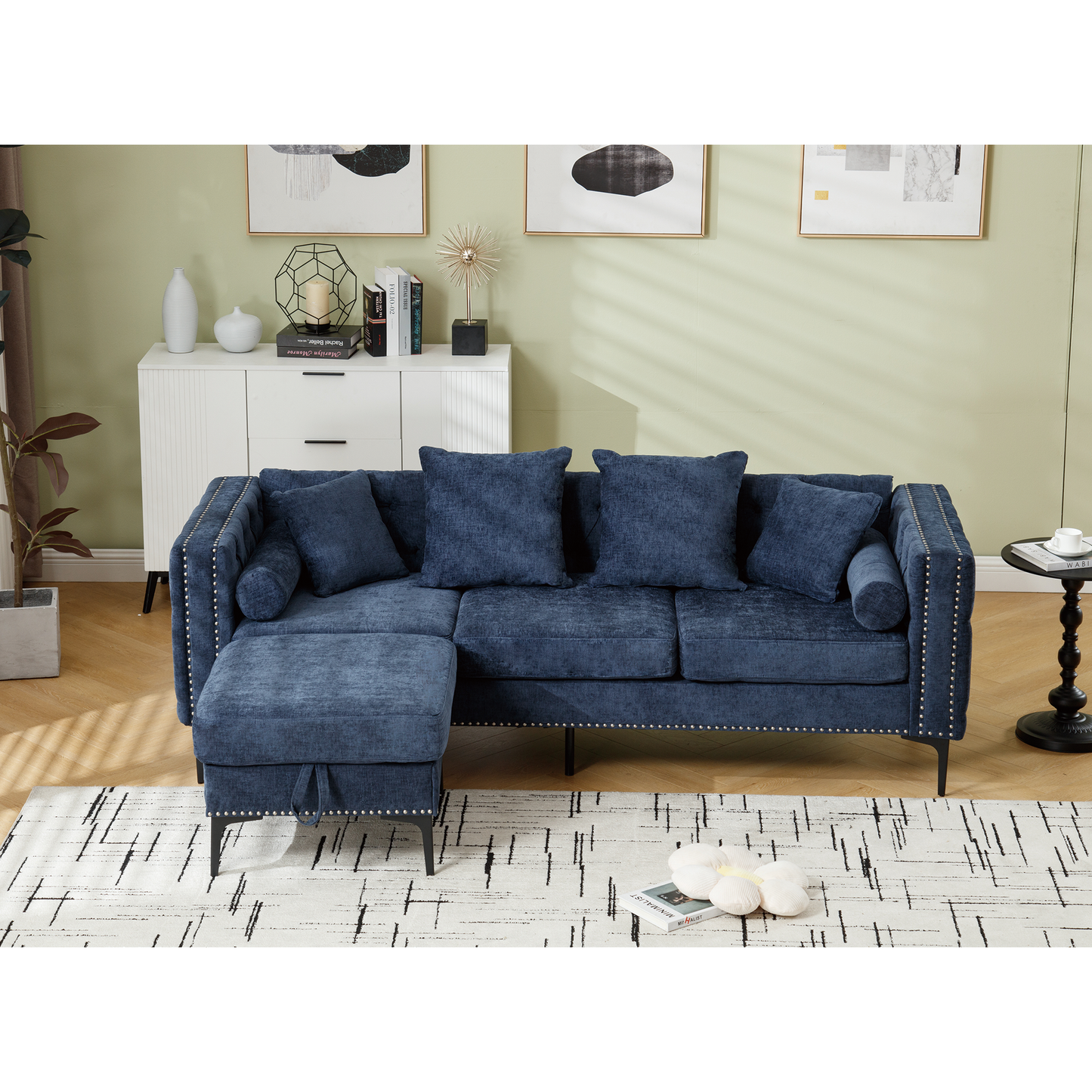 Deep navy blue velvet sectional sofa with chaise lounge and studded trim