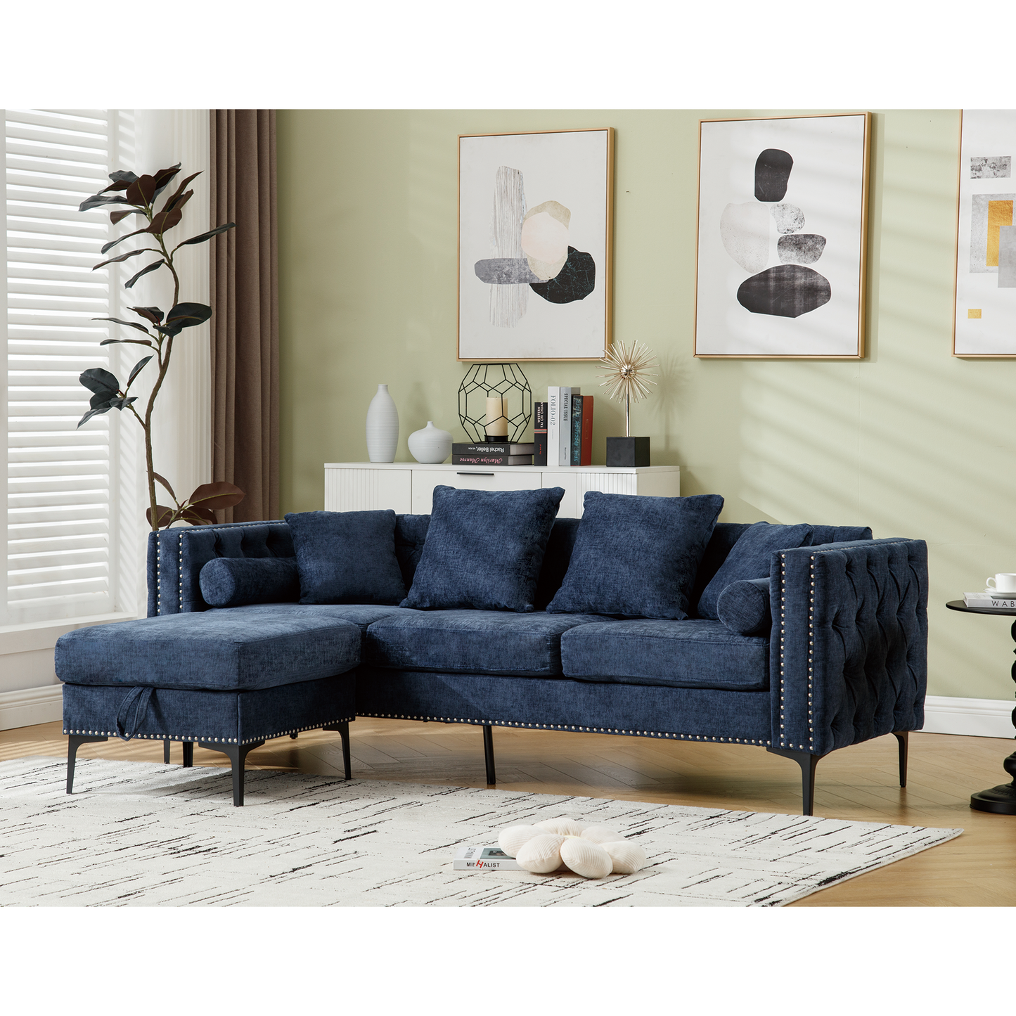 Navy blue velvet sectional sofa with tufted back and silver nailhead trim