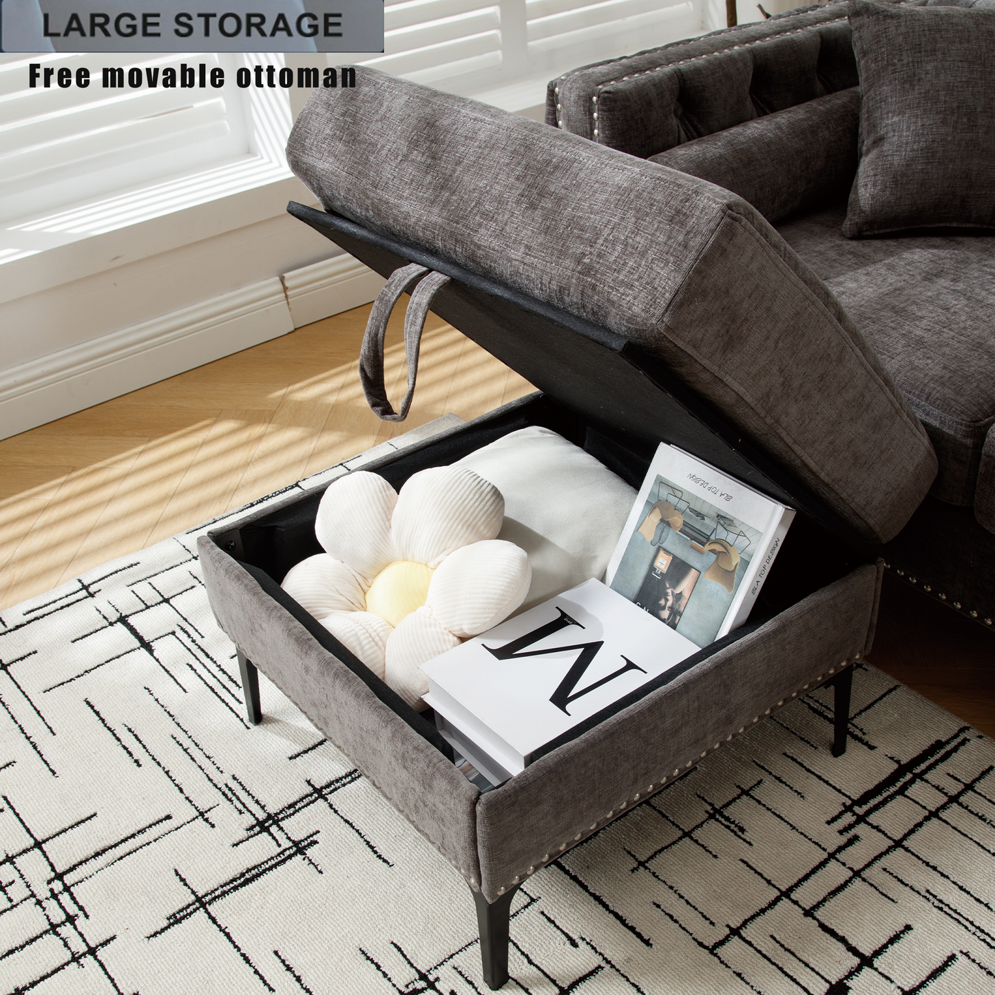 Gray fabric storage ottoman open with pillows and books inside
