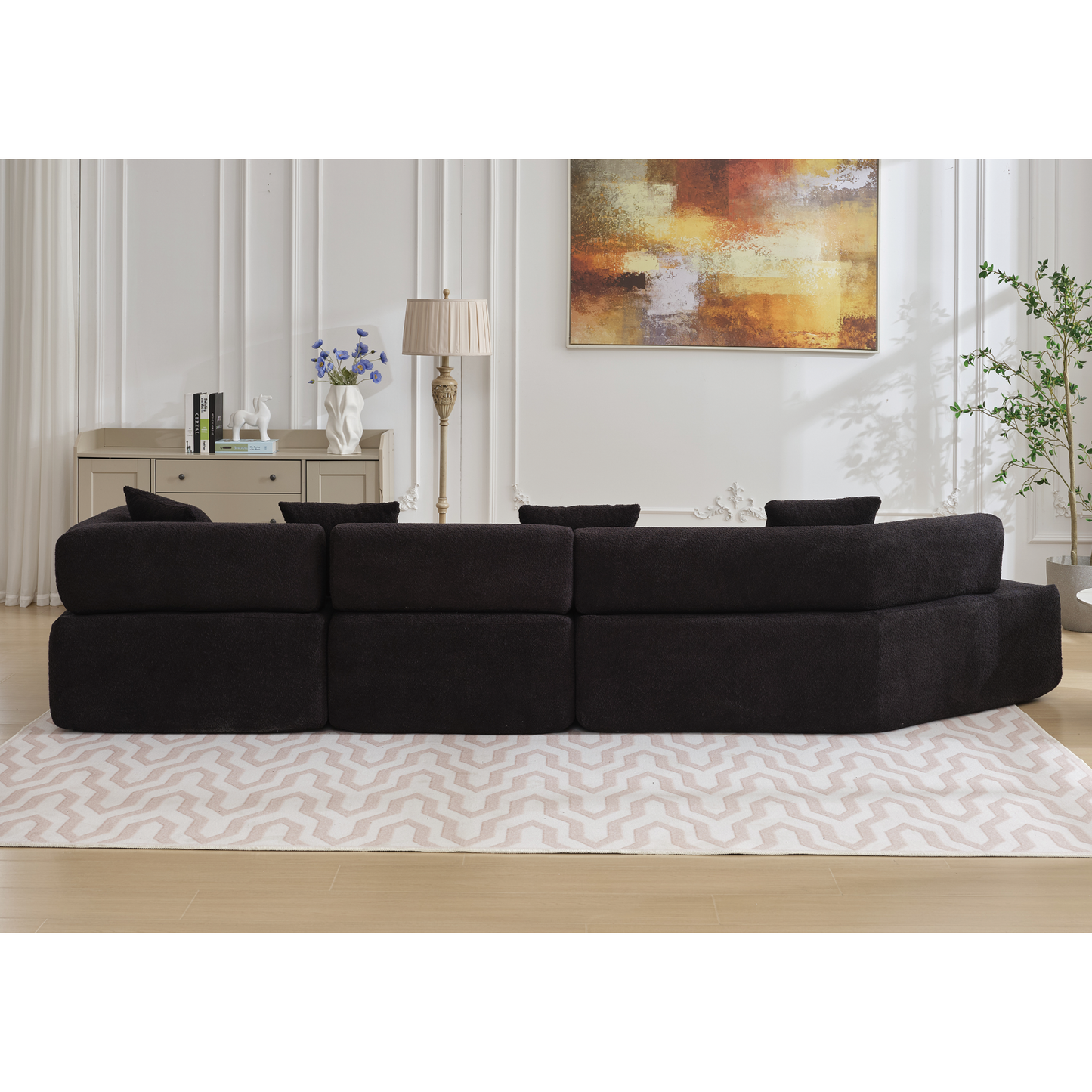 Dark charcoal boucle fabric sectional sofa with plush cushions contemporary design