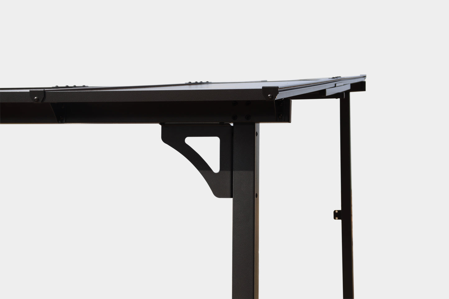 Dark brown metal patio canopy frame detail with angled support bracket