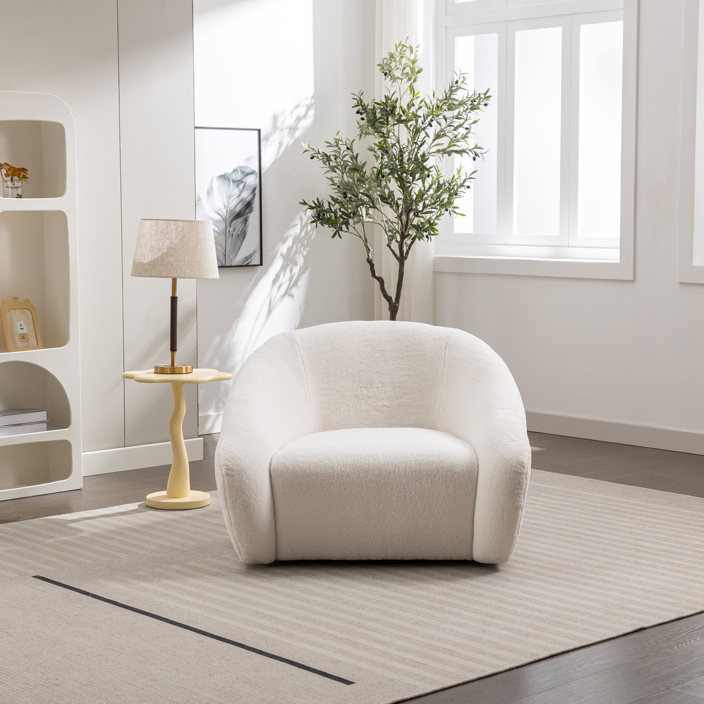 Plush ivory boucle armchair with rounded silhouette and comfortable seating for modern living rooms