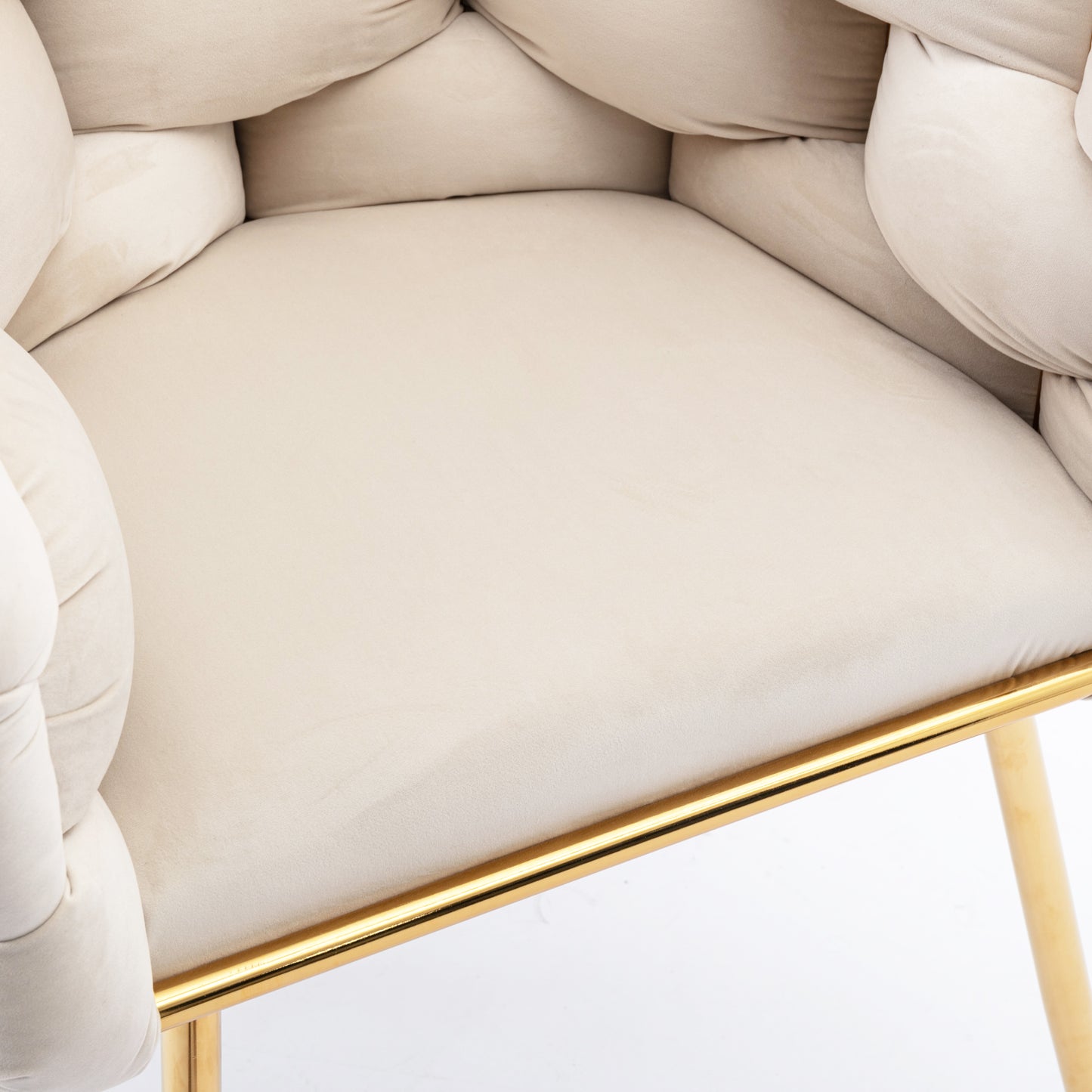 Plush cream velvet accent chair with tufted backrest and gold metal legs