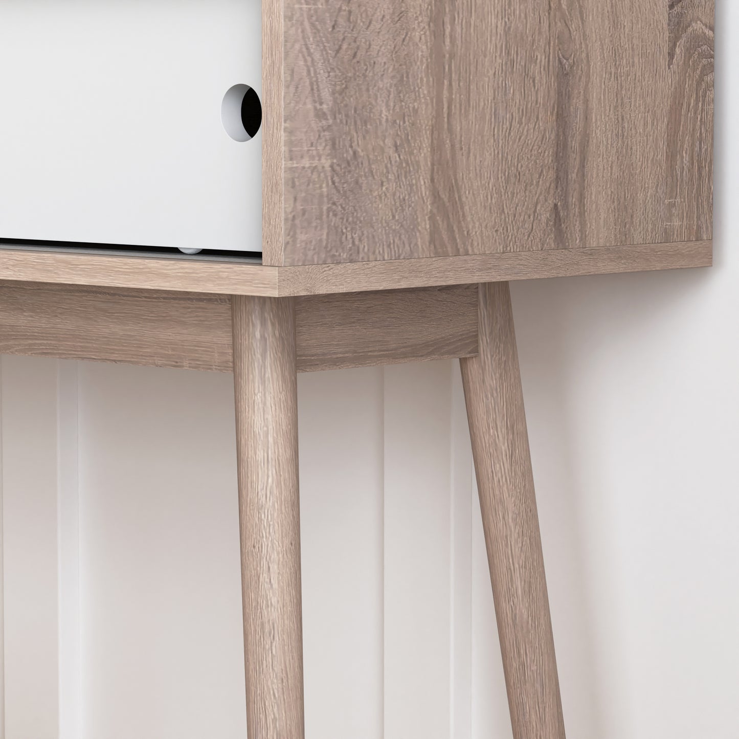 Modern white drawer with woodgrain accents and tapered legs stylish accent cabinet