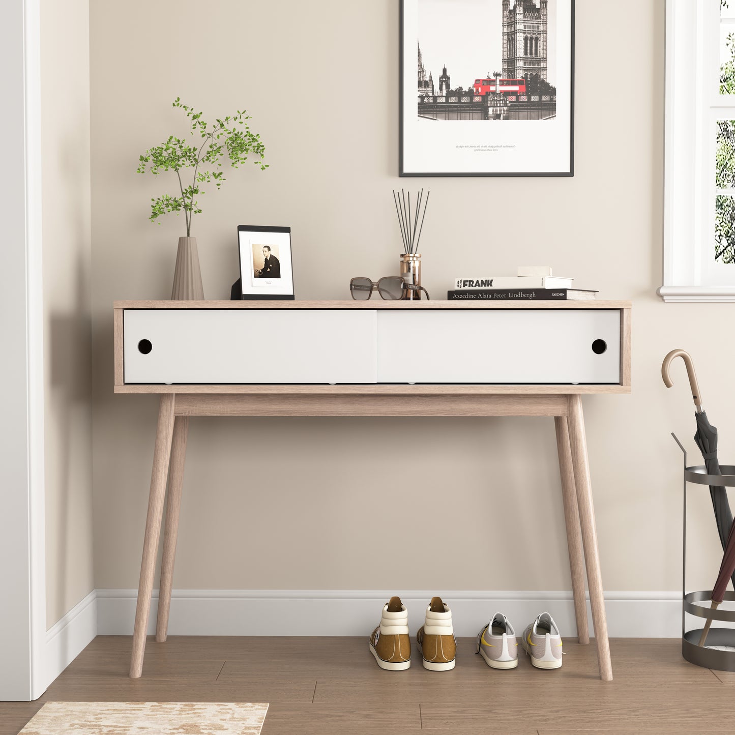 Midcentury modern console table with white drawers and oak legs