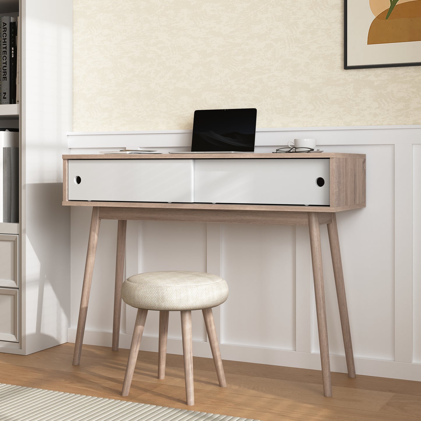 Light oak midcentury modern desk with white sliding drawers and a laptop on top