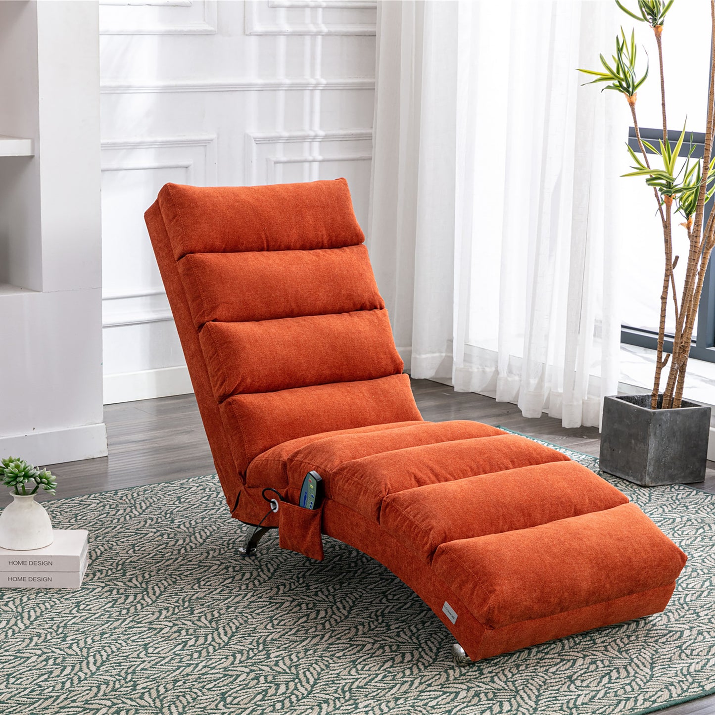 Orange fabric reclining lounge chair with plush cushioning and a remote control pocket