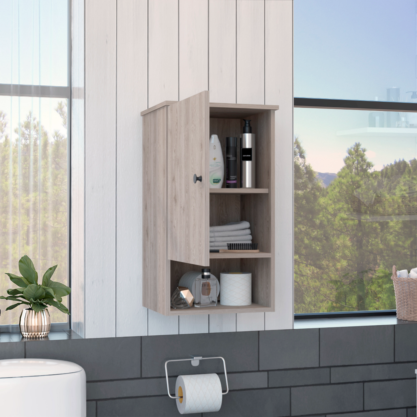 Light wood bathroom wall cabinet with open door holding toiletries and towels