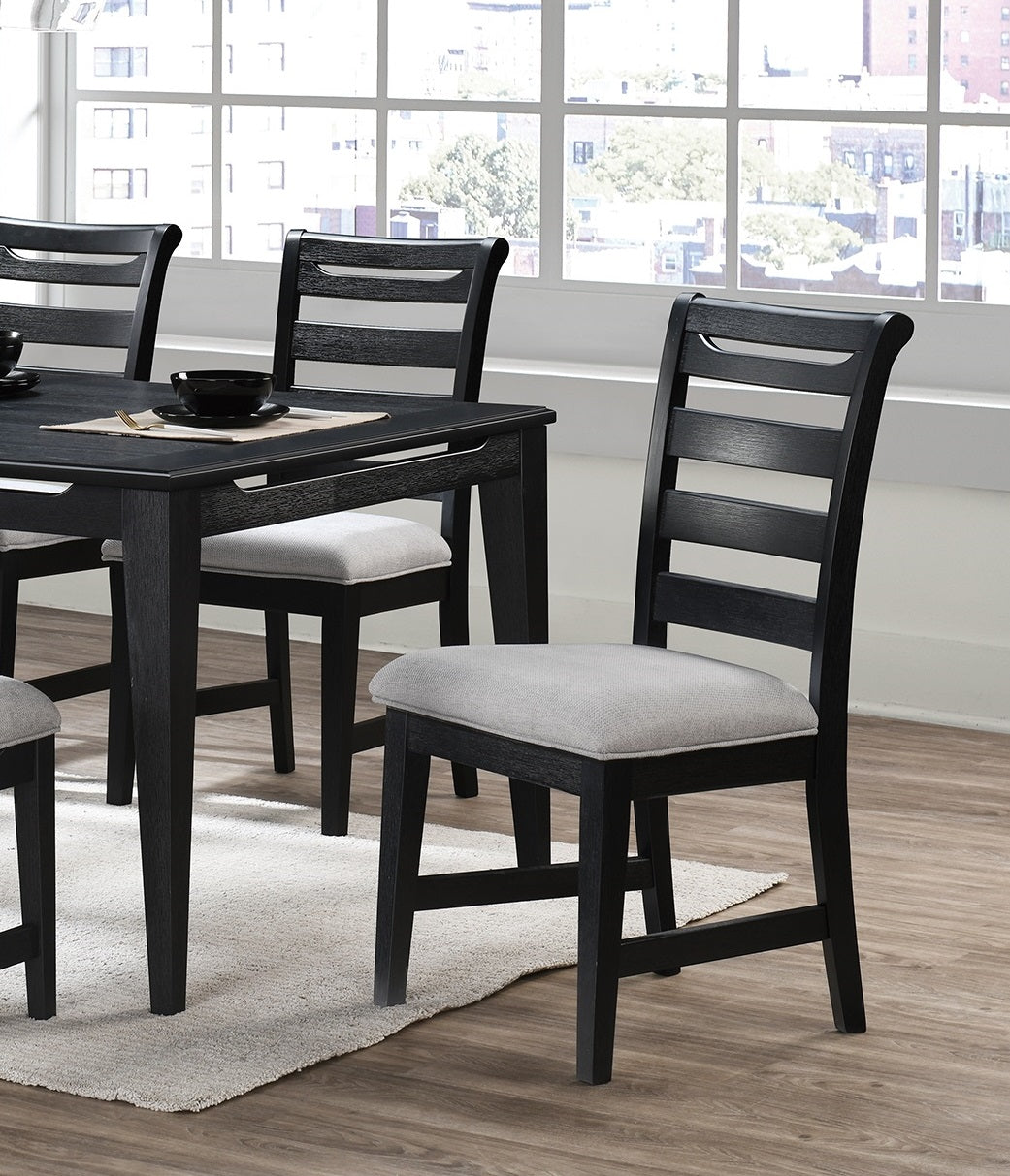 Black wooden dining chair with upholstered grey seat and horizontal back slats