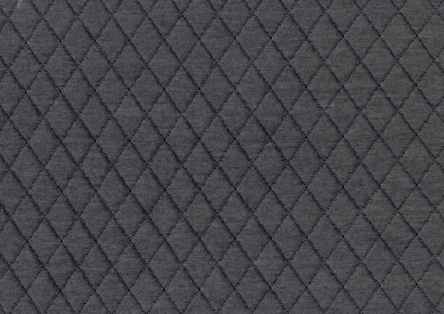 Dark grey quilted fabric with a diamond pattern perfect for upholstery