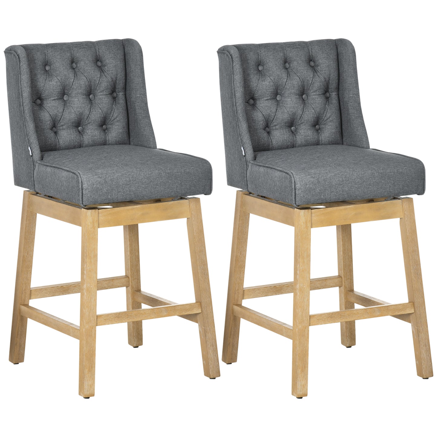 Two grey upholstered swivel bar stools with tufted backs and light wood legs