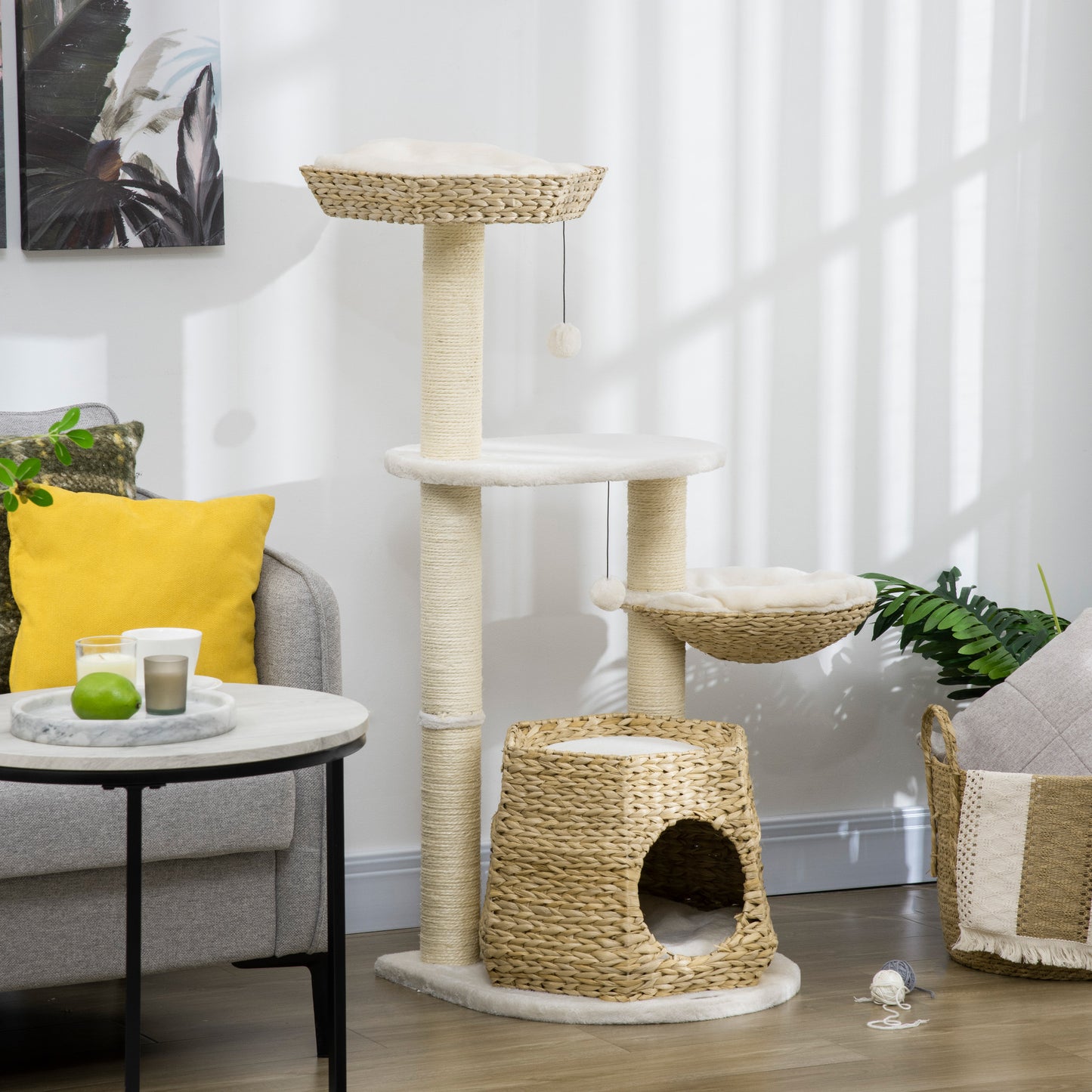 Multilevel cat tree with sisal posts and woven baskets for climbing and lounging