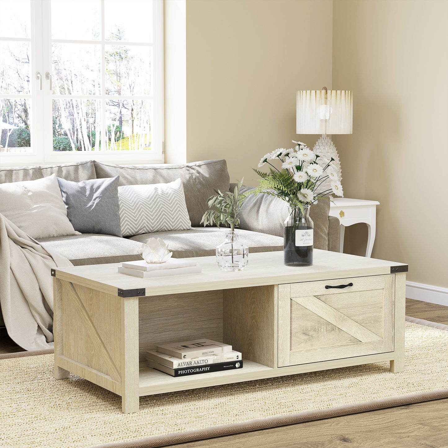 Light wood coffee table with a drawer and open shelf a rustic farmhouse design