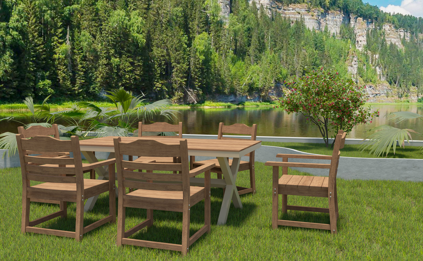 Wooden outdoor dining set with four chairs and a table on green grass by a lake