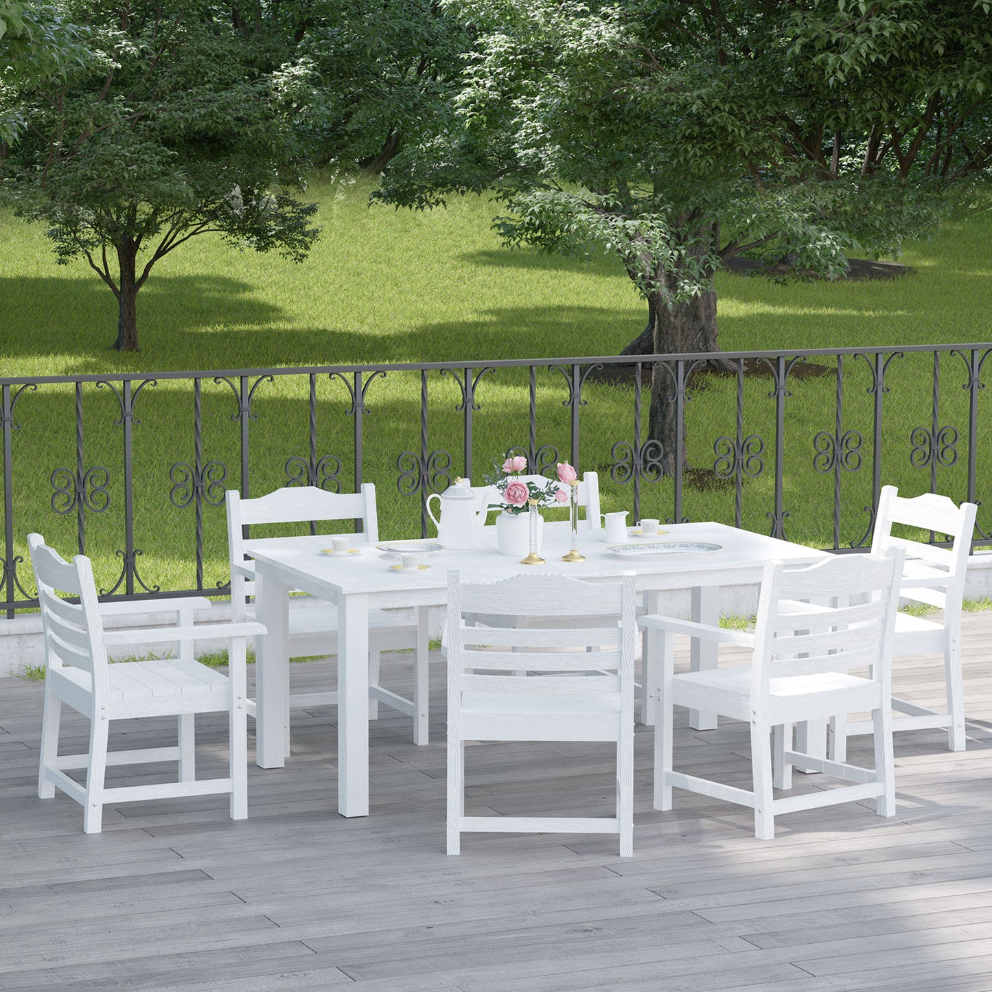 White wooden dining set with six chairs on a patio