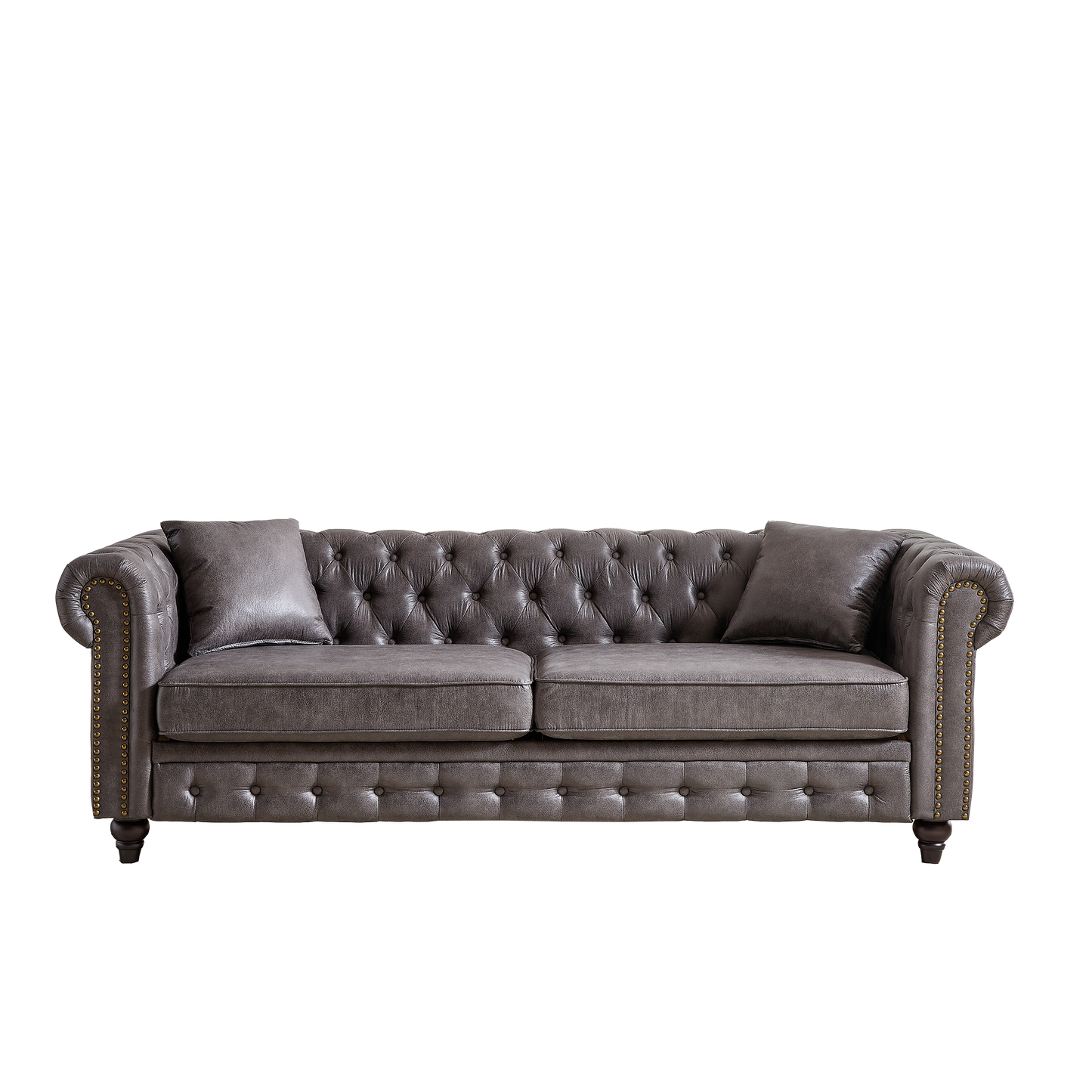 Dark gray leather Chesterfield sofa with button tufting and brass nailhead trim
