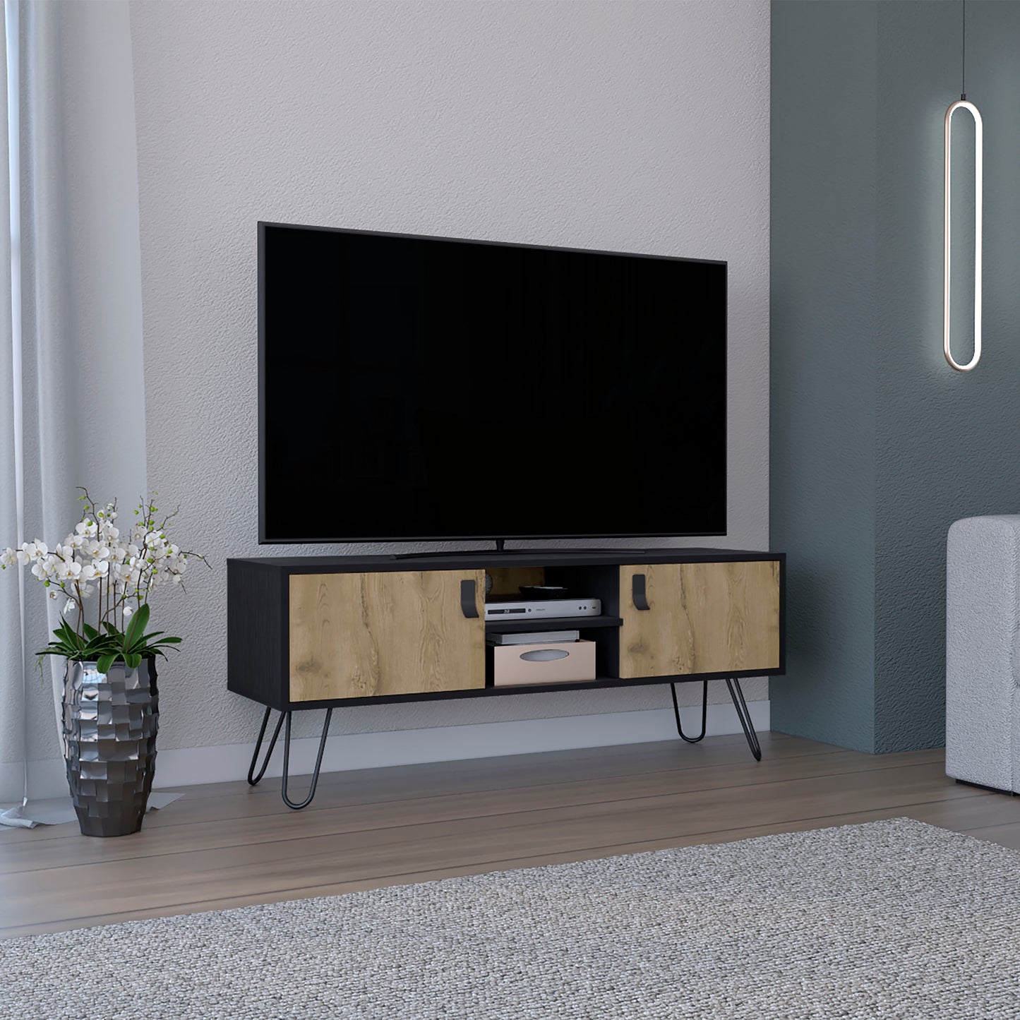 Black media console with natural wood veneer doors and hairpin legs