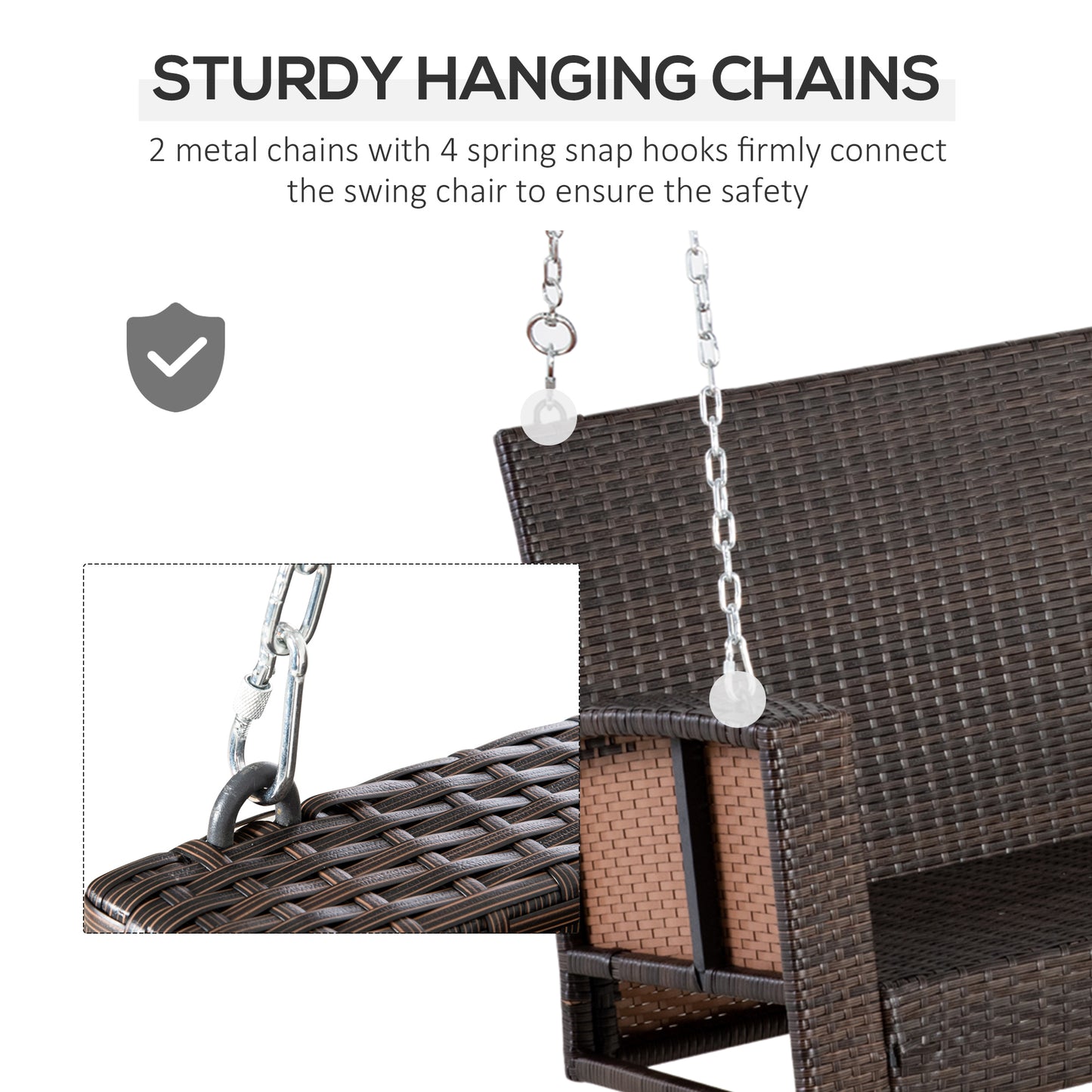 Sturdy metal hanging chains connect a brown rattan swing chair with white decorative spheres