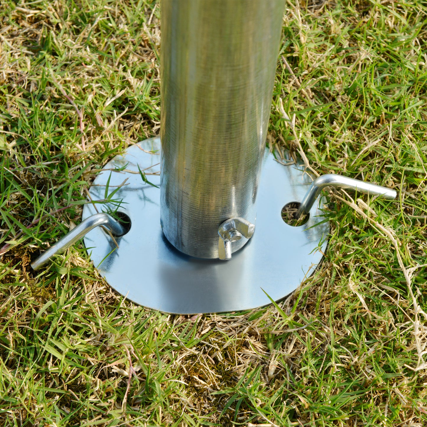 Galvanized steel umbrella base with securing pegs and bolt