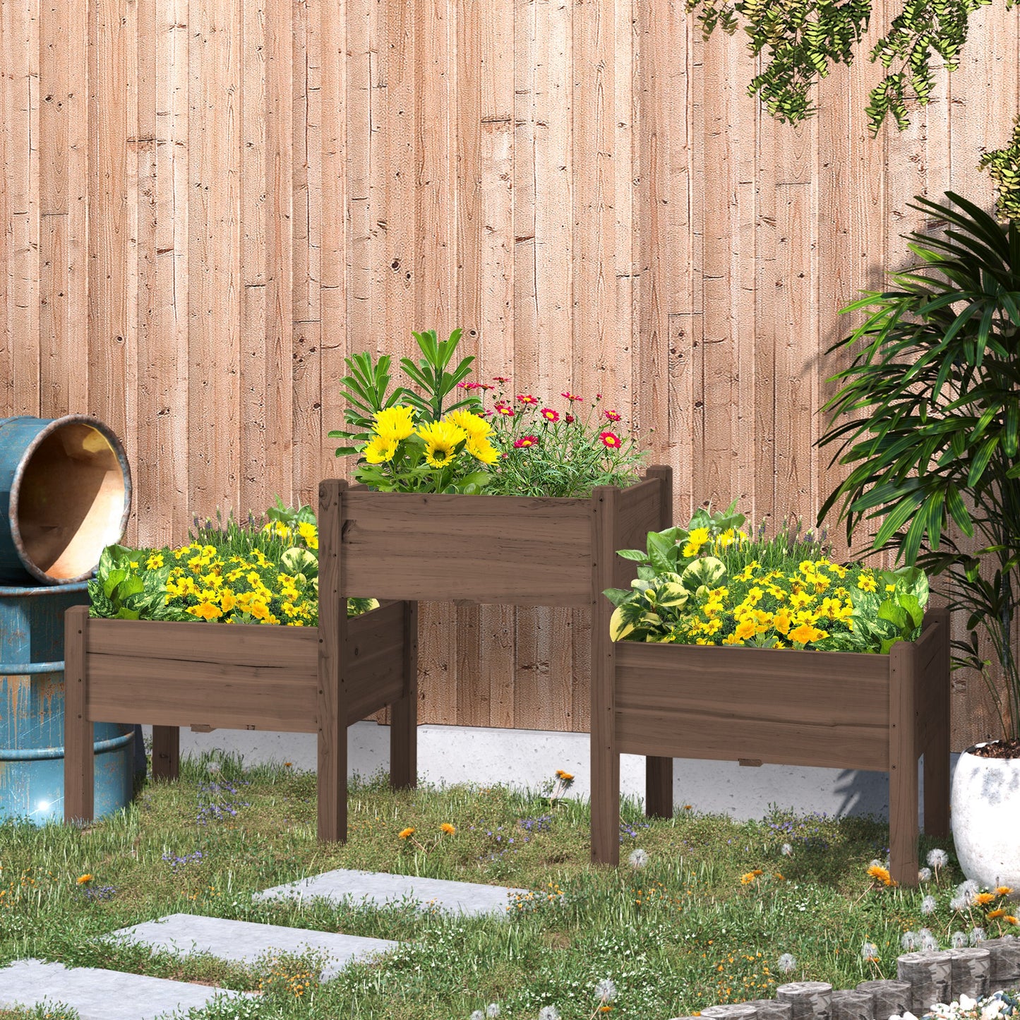 Threetiered dark brown wooden raised garden beds filled with yellow flowers and greenery