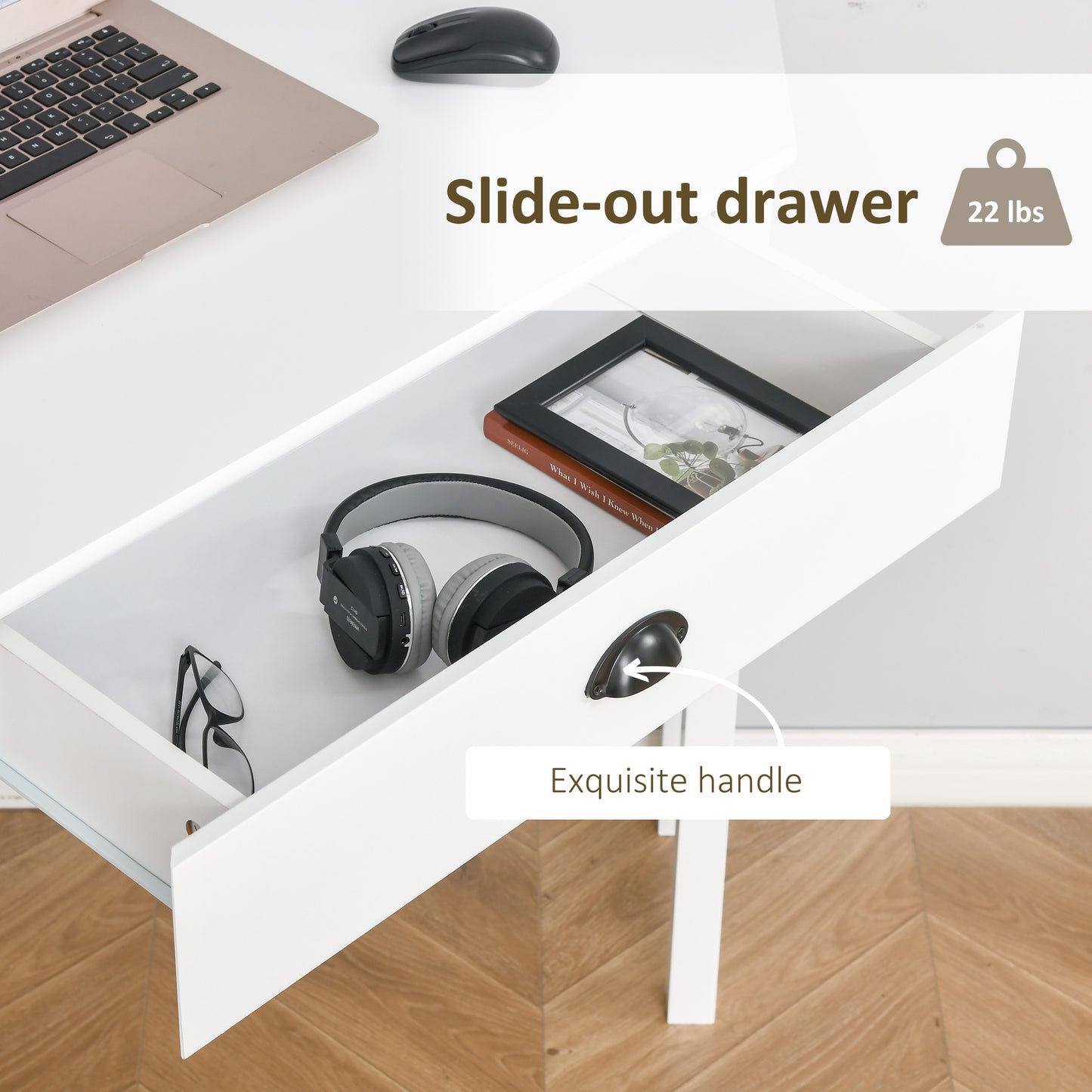 White desk slideout drawer with black headphones and glasses inside