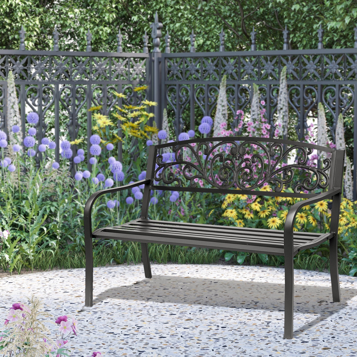 Dark gray metal garden bench with ornate scrollwork backrest