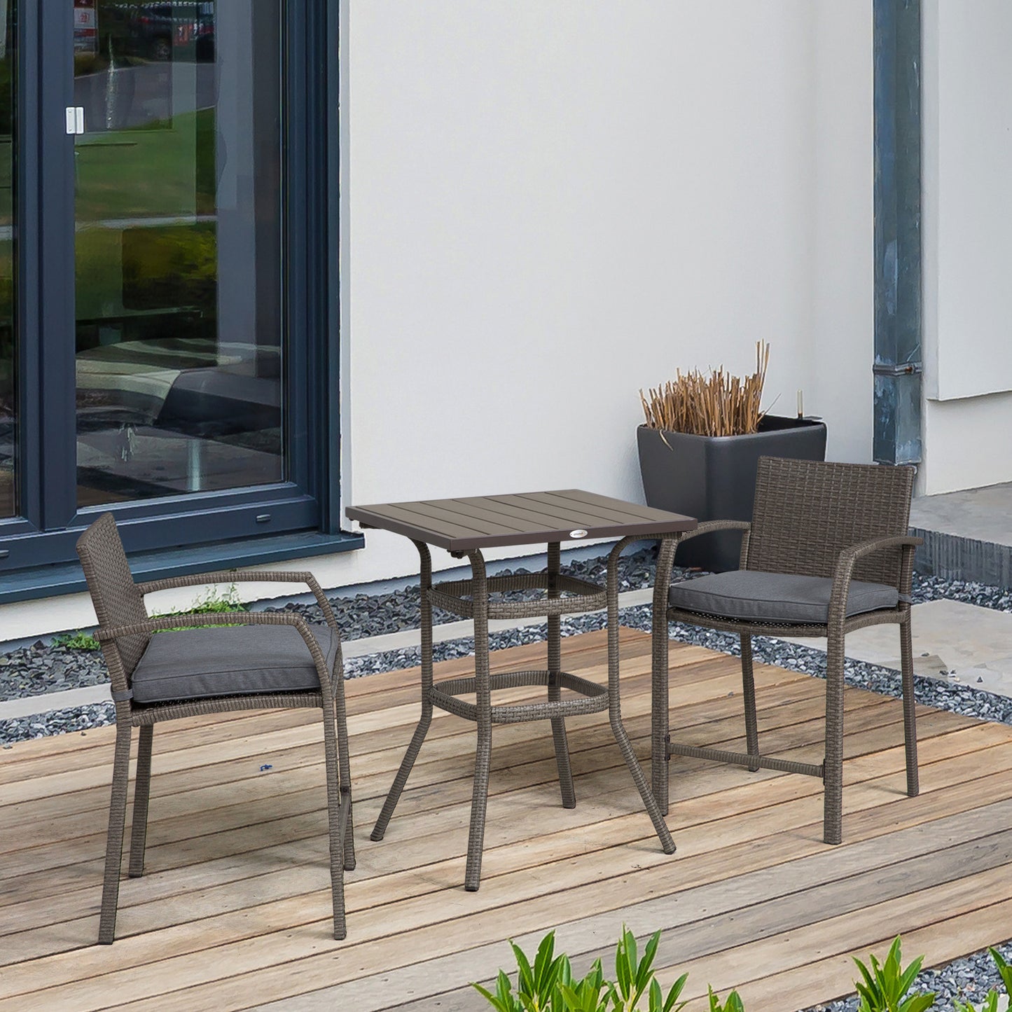 Brown rattan bar table set with grey cushions ideal for outdoor patio dining