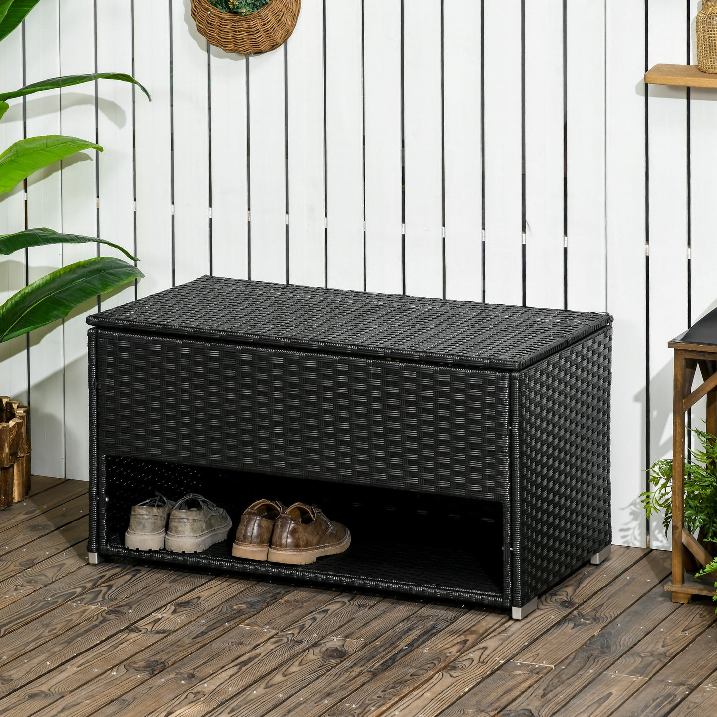 Black rattan storage bench with shoe rack perfect for outdoor patios