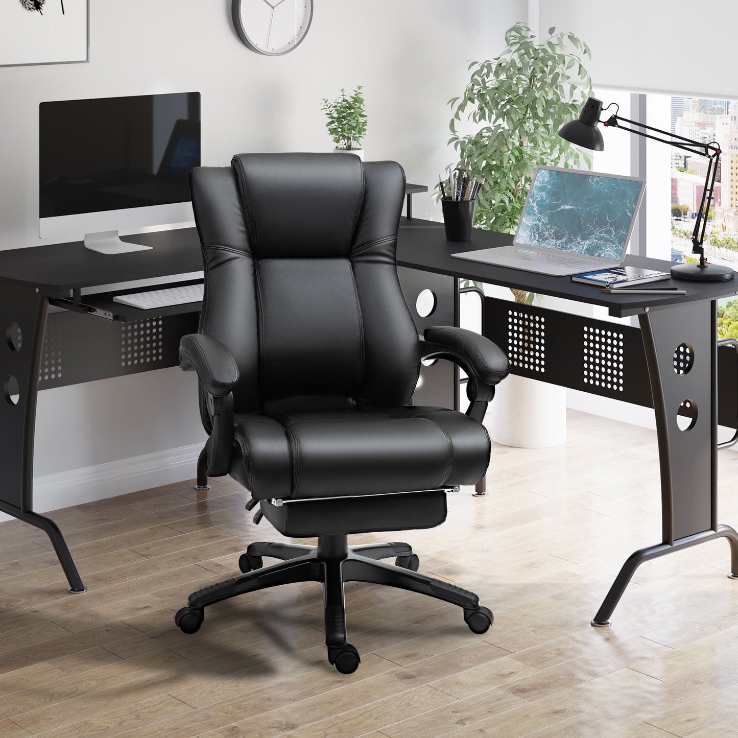 Black executive chair with ergonomic design and retractable footrest for ultimate comfort
