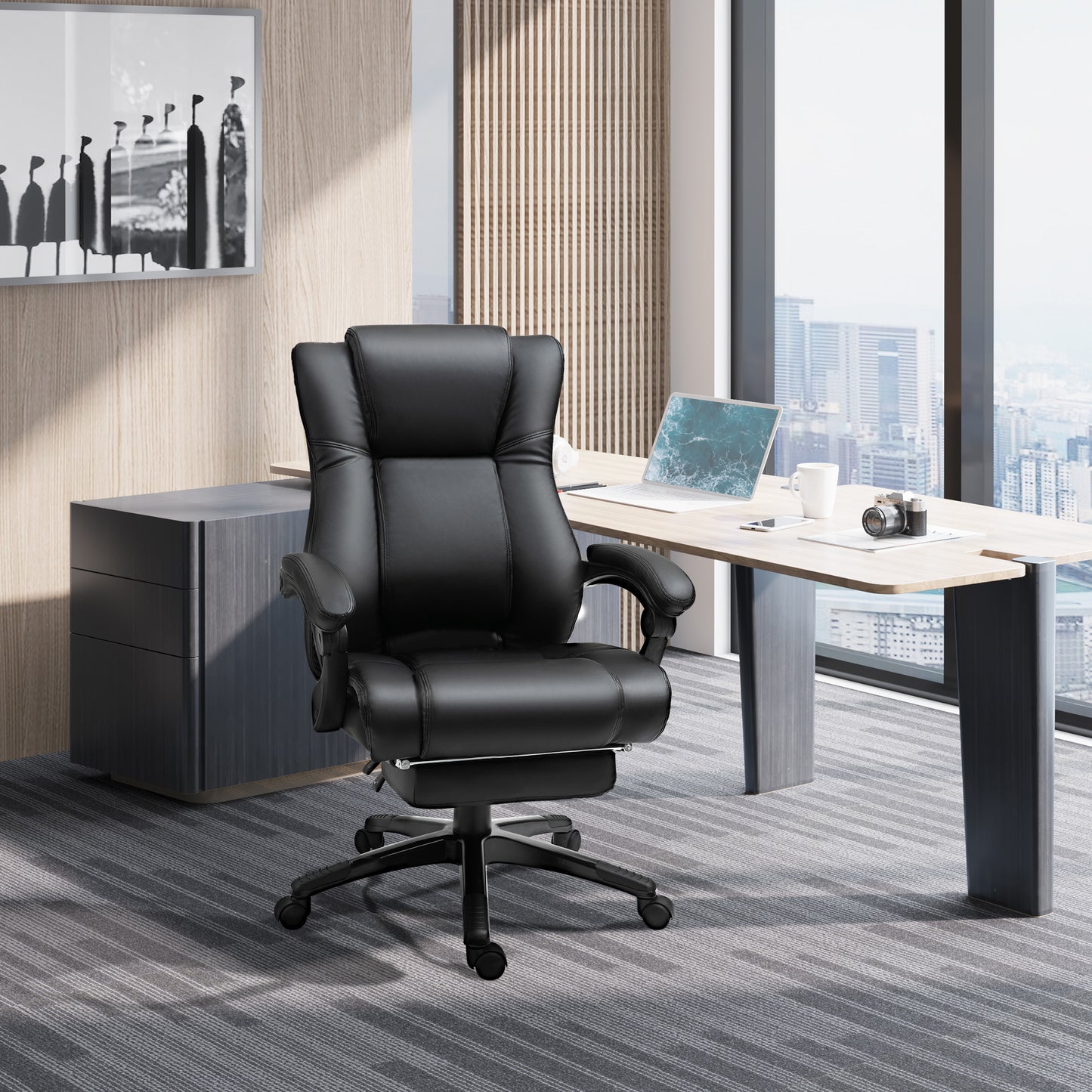 Black leather ergonomic office chair with padded headrest and retractable footrest