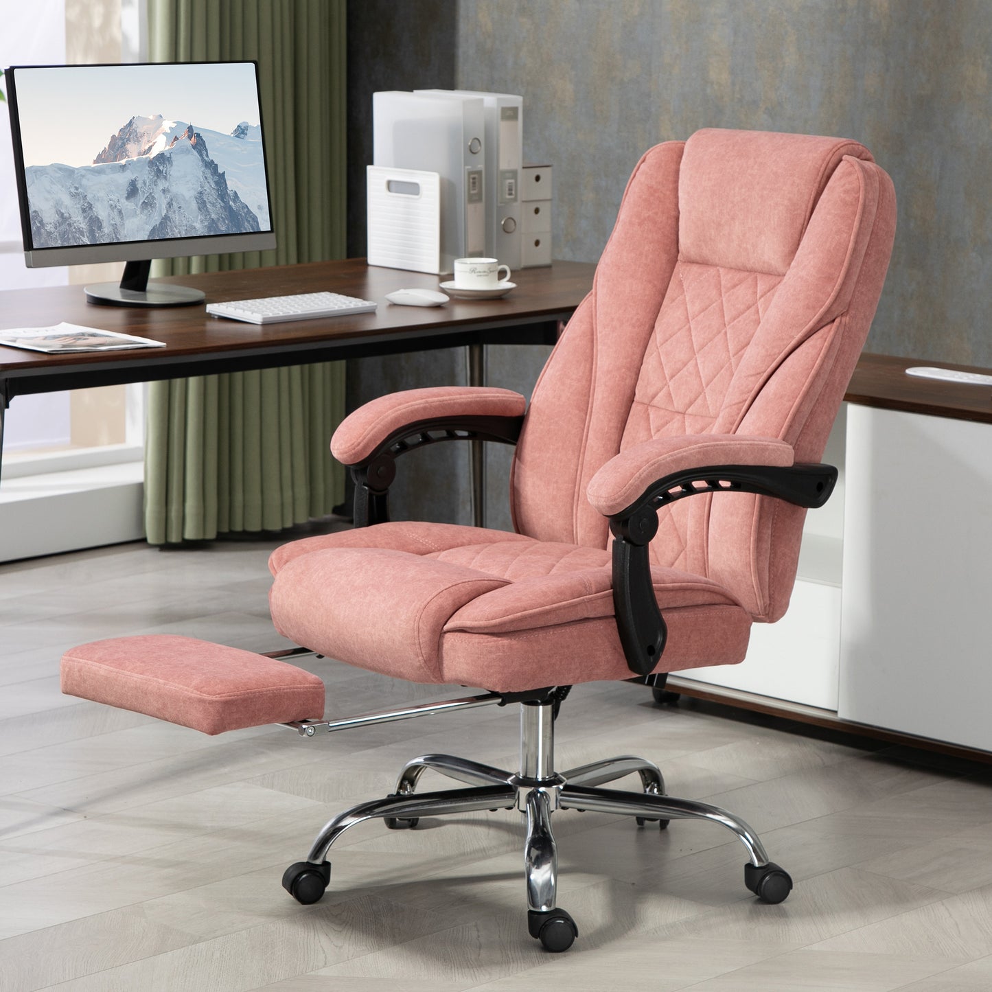 Pink fabric executive chair with diamond stitching and retractable footrest for comfort
