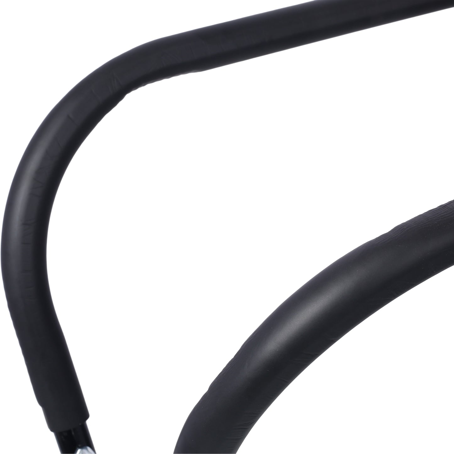 Black rubberized grip on curved metal handlebar for ergonomic fitness equipment