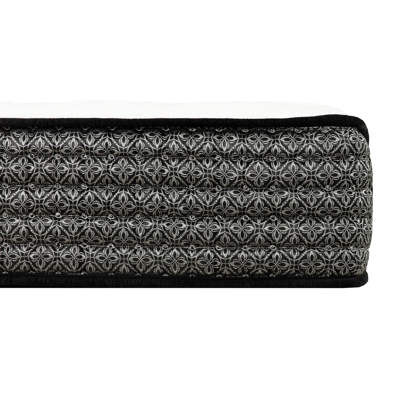 Closeup of a queen size mattress with a black and silver damask pattern quilted fabric
