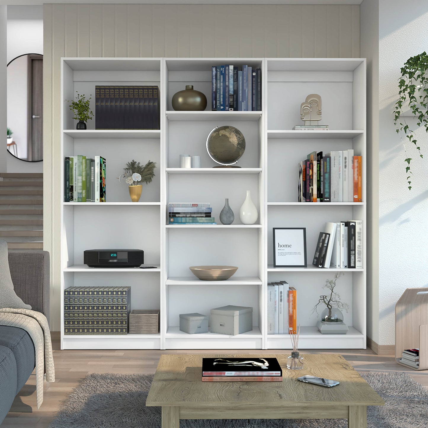 White modern bookshelf filled with books decor and a globe