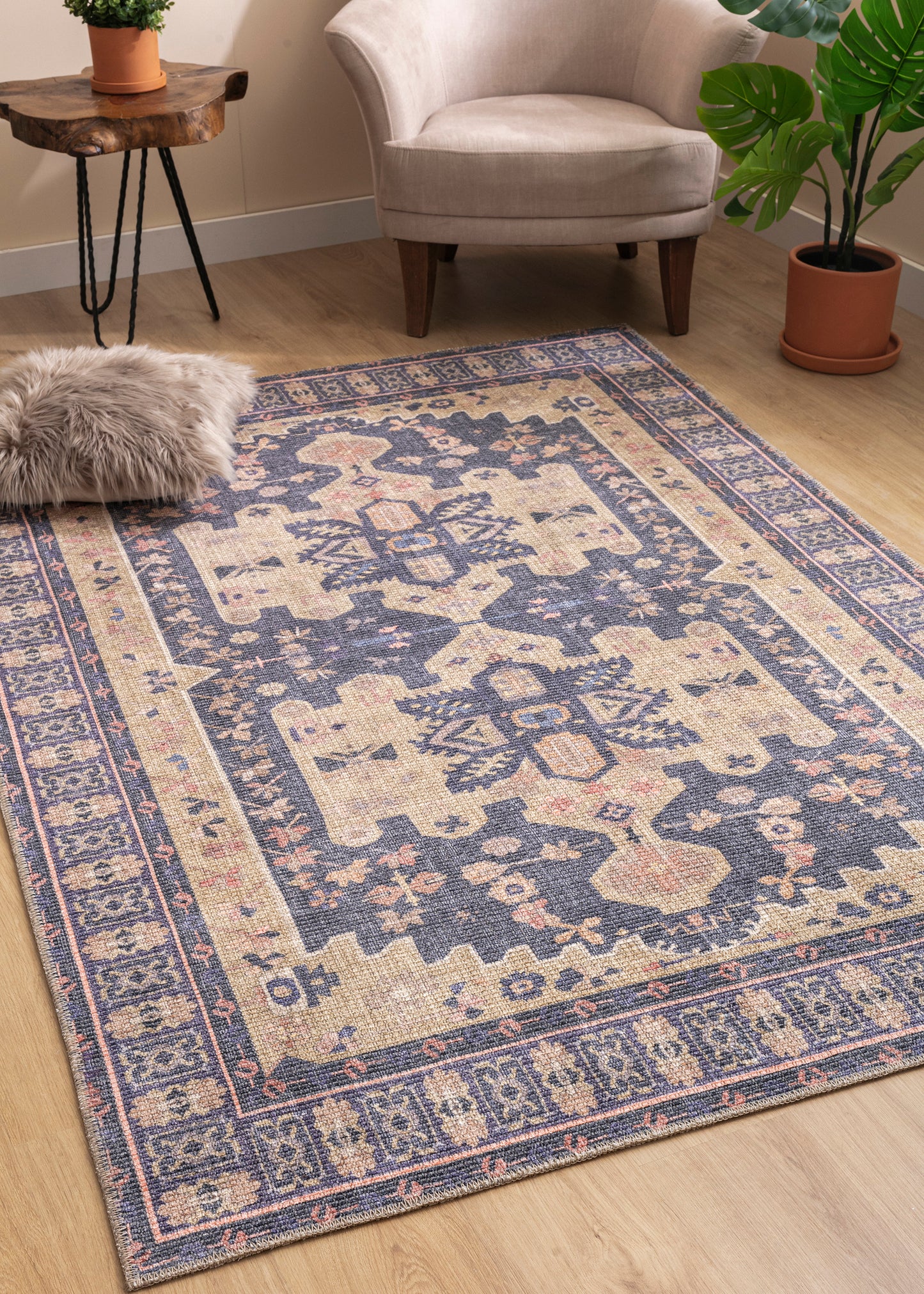 Traditional Persian rug with intricate blue and tan patterns perfect for living rooms