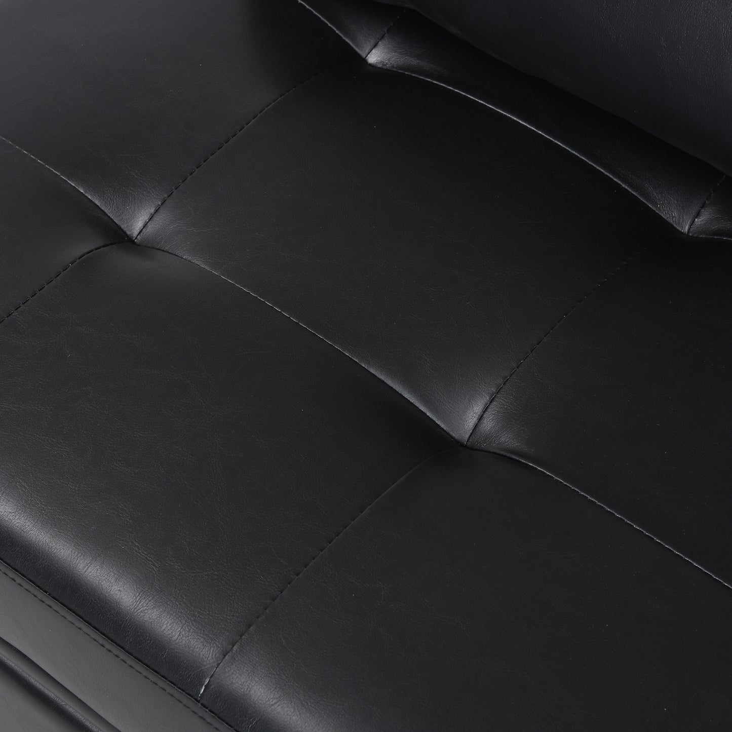 Black faux leather sofa with tufted detailing modern living room furniture