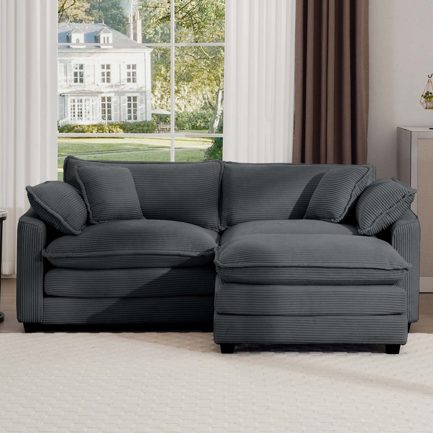 Comfortable dark gray corduroy sectional sofa with plush cushions ideal for living rooms