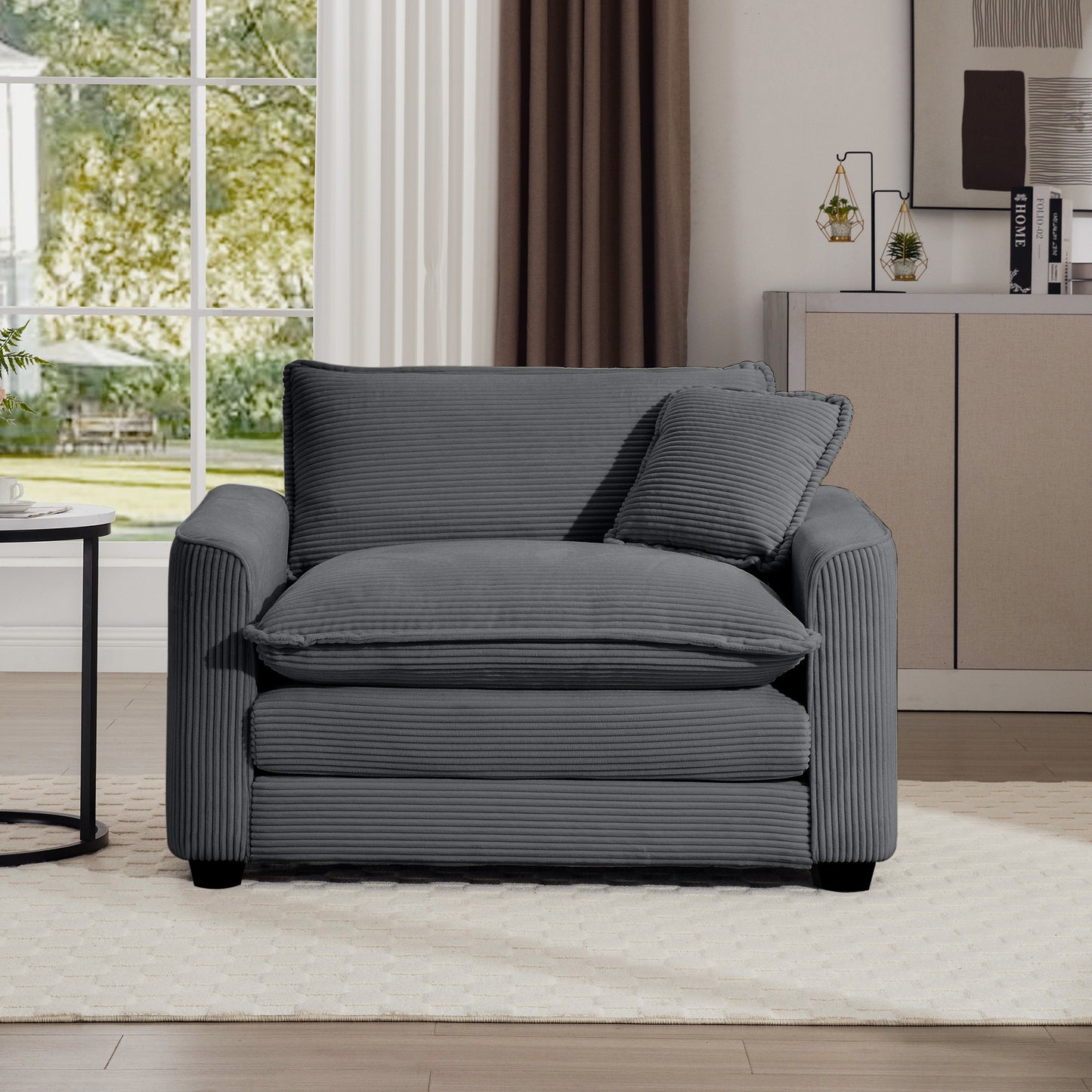 Cozy corduroy armchair in charcoal gray perfect for modern living rooms