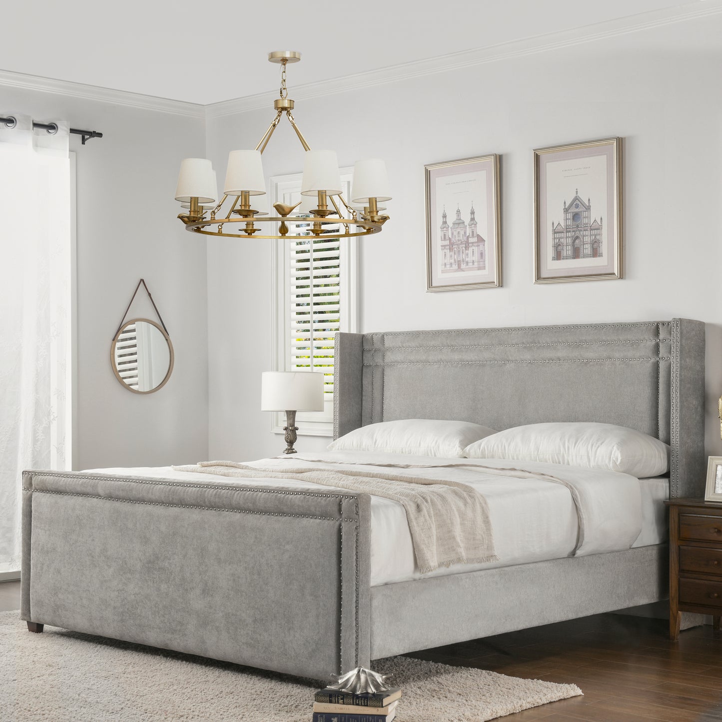 Elegant grey velvet king bed with silver nailhead trim